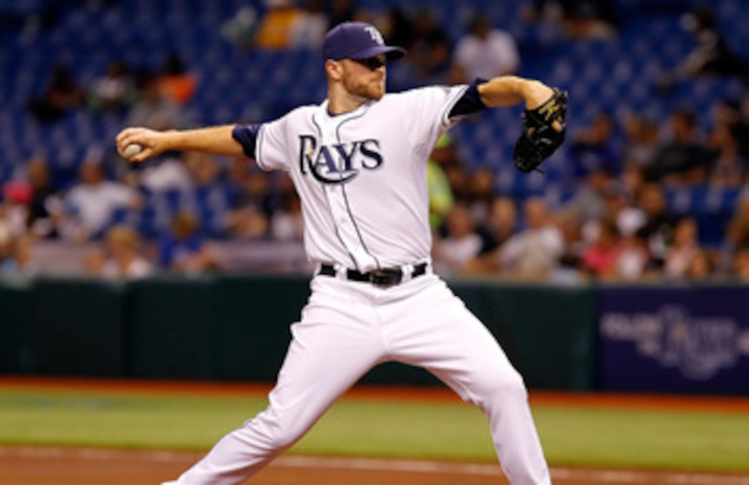 ST. PETERSBURG, FL - APRIL 15:  Pitcher Wade Davis #40 of the Tampa Bay Rays pitches against the Minnesota Twins during the game at Tropicana Field on April 15, 2011 in St. Petersburg, Florida.  (Photo by J. Meric/Getty Images)