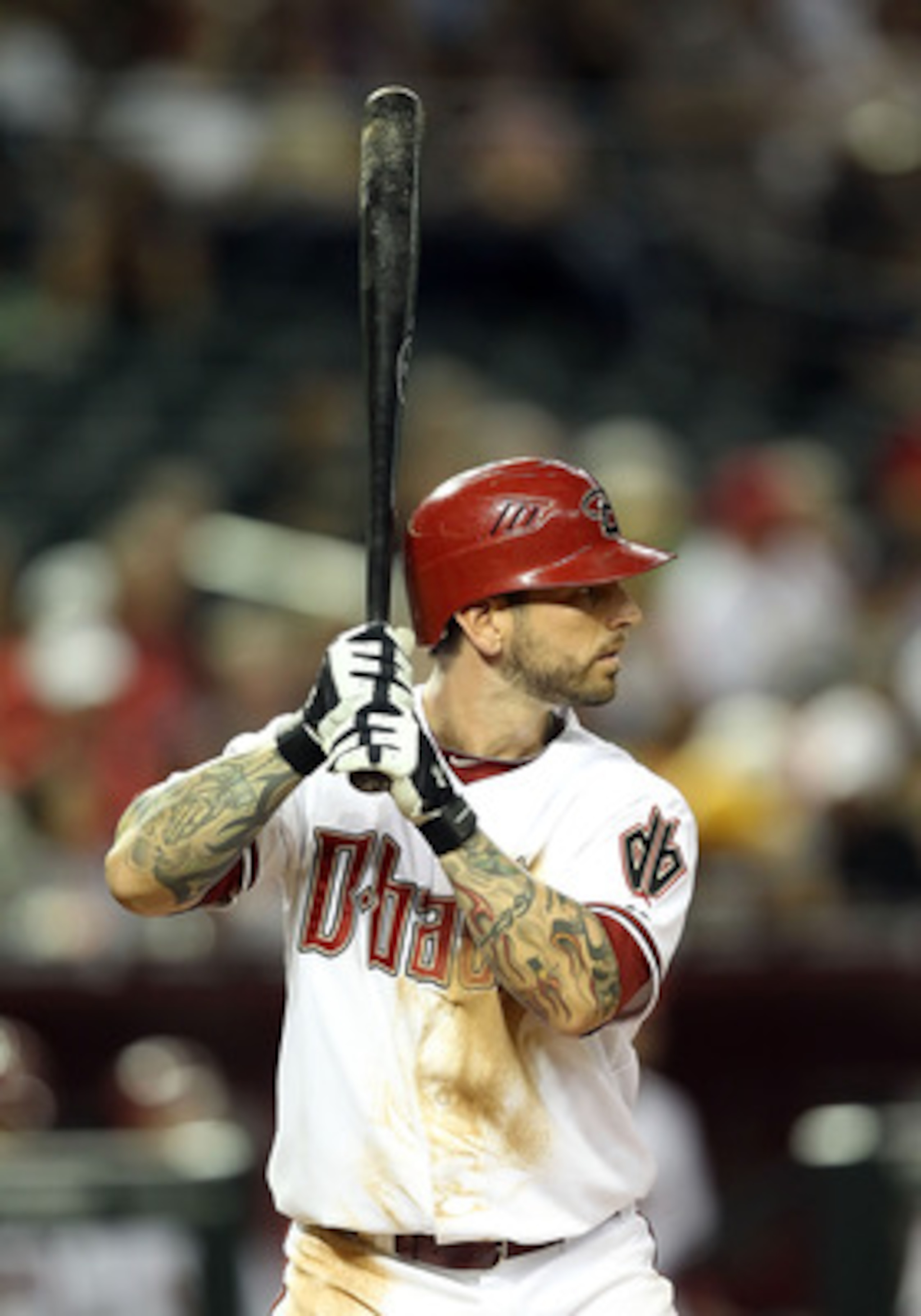 PHOENIX, AZ - APRIL 12:  Ryan Roberts #14 of the St. Louis Cardinals bats against the Arizona Diamondbacks during the Major League Baseball game at Chase Field on April 12, 2011 in Phoenix, Arizona.   The Diamondbacks defeated the Cardinals 13-8.  (Photo