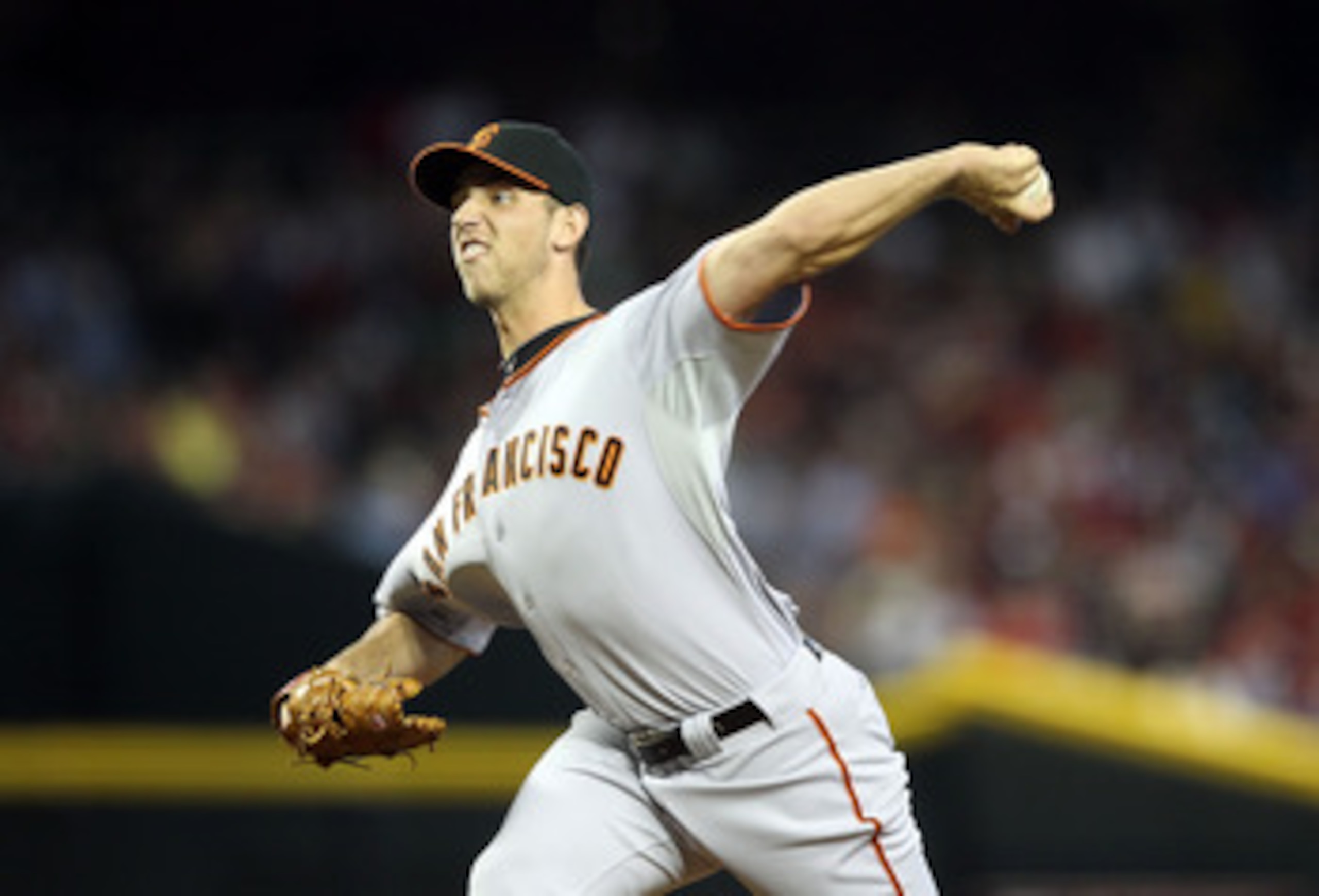 PHOENIX, AZ - APRIL 17:  Starting pitcher Madison Bumgarner #40 of the San Francisco Giants pitches against the Arizona Diamondbacks during the Major League Baseball game at Chase Field on April 17, 2011 in Phoenix, Arizona.  (Photo by Christian Petersen/