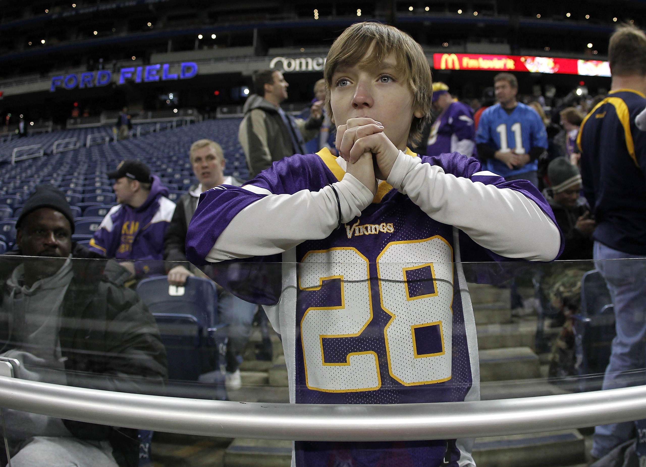 DETROIT, MI - DECEMBER 13:   A young fan looks on prior to the Minnesota Vikings playing the New York Giants at Ford Field on December 13, 2010 in Detroit, Michigan.  (Photo by Gregory Shamus/Getty Images)