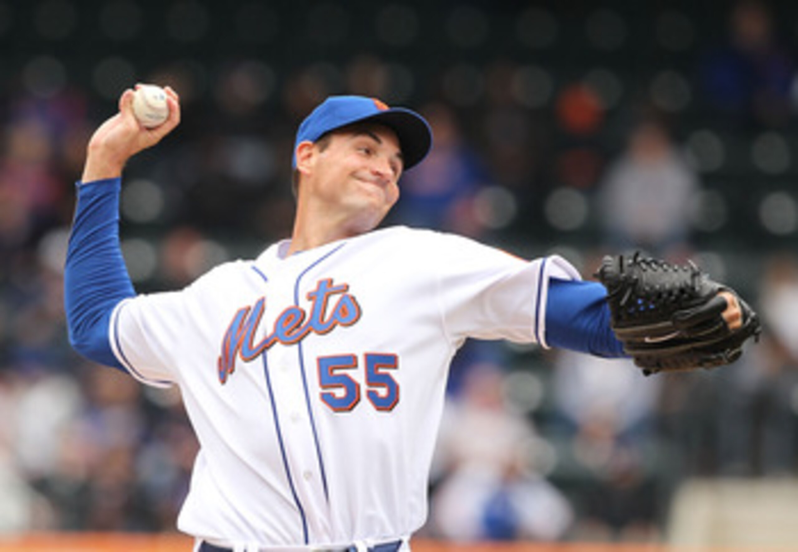 NEW YORK, NY - APRIL 10:  Chris Young #55 of the New York Mets pitches against the Washington Nationals during their game on April 10, 2011 at Citi Field in the Flushing neighborhood of the Queens borough of New York City.  (Photo by Al Bello/Getty Images