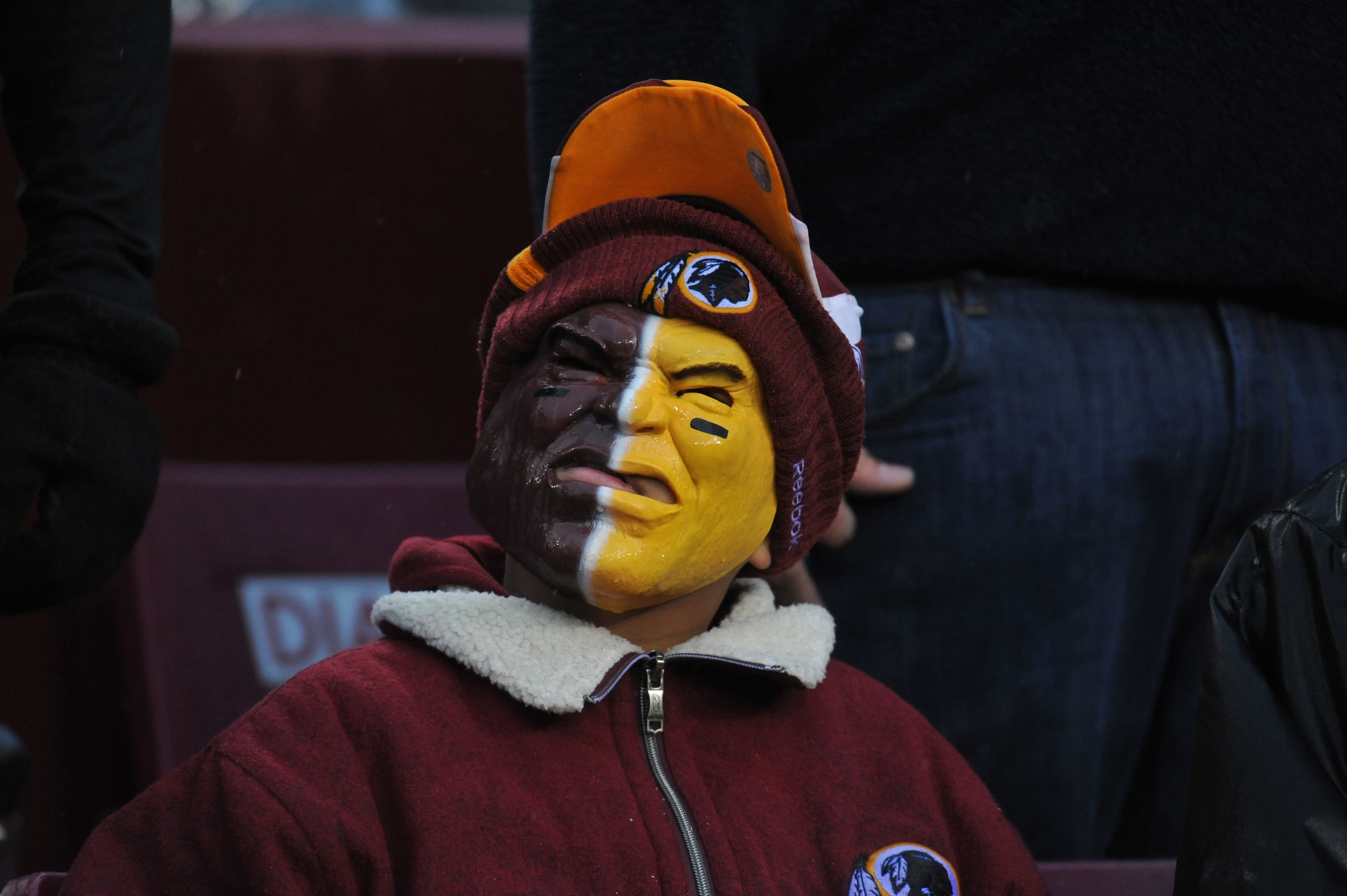 LANDOVER, MD - DECEMBER 12:  A fan of the Washington Redskins watches the game against the Tampa Bay Buccaneers  at FedExField on December 12, 2010 in Landover, Maryland. The Buccaneers defeated the Redskins 17-16. (Photo by Larry French/Getty Images)