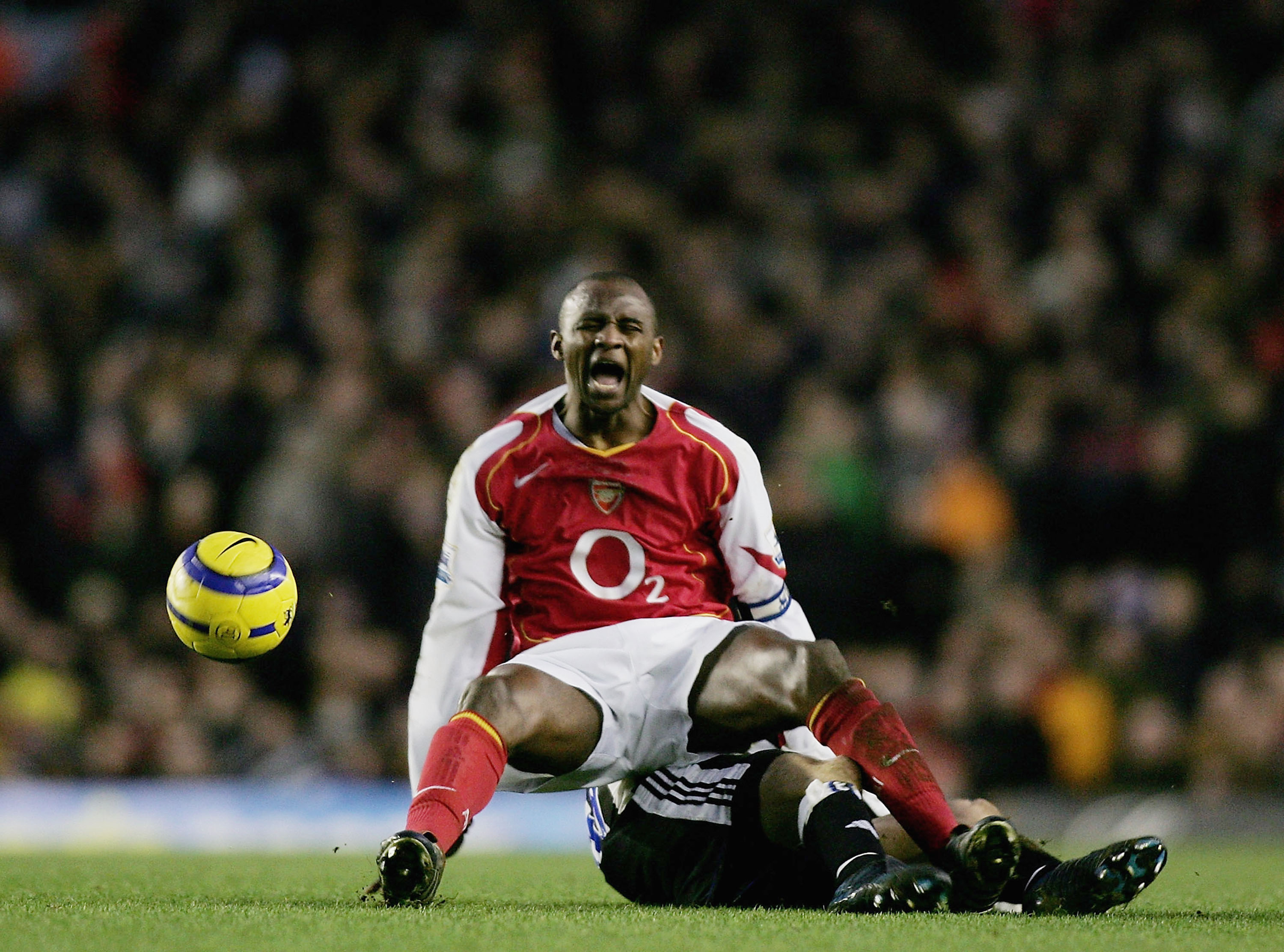 LONDON - JANUARY 23: Patrick Vieira of Arsenal is tackled and fouled by Lee Bowyer of Newcastle, during the Barclays Premiership match between Arsenal and Newcastle United at Highbury on January 23, 2005 in London, England.  (Photo by Ben Radford/Getty Im