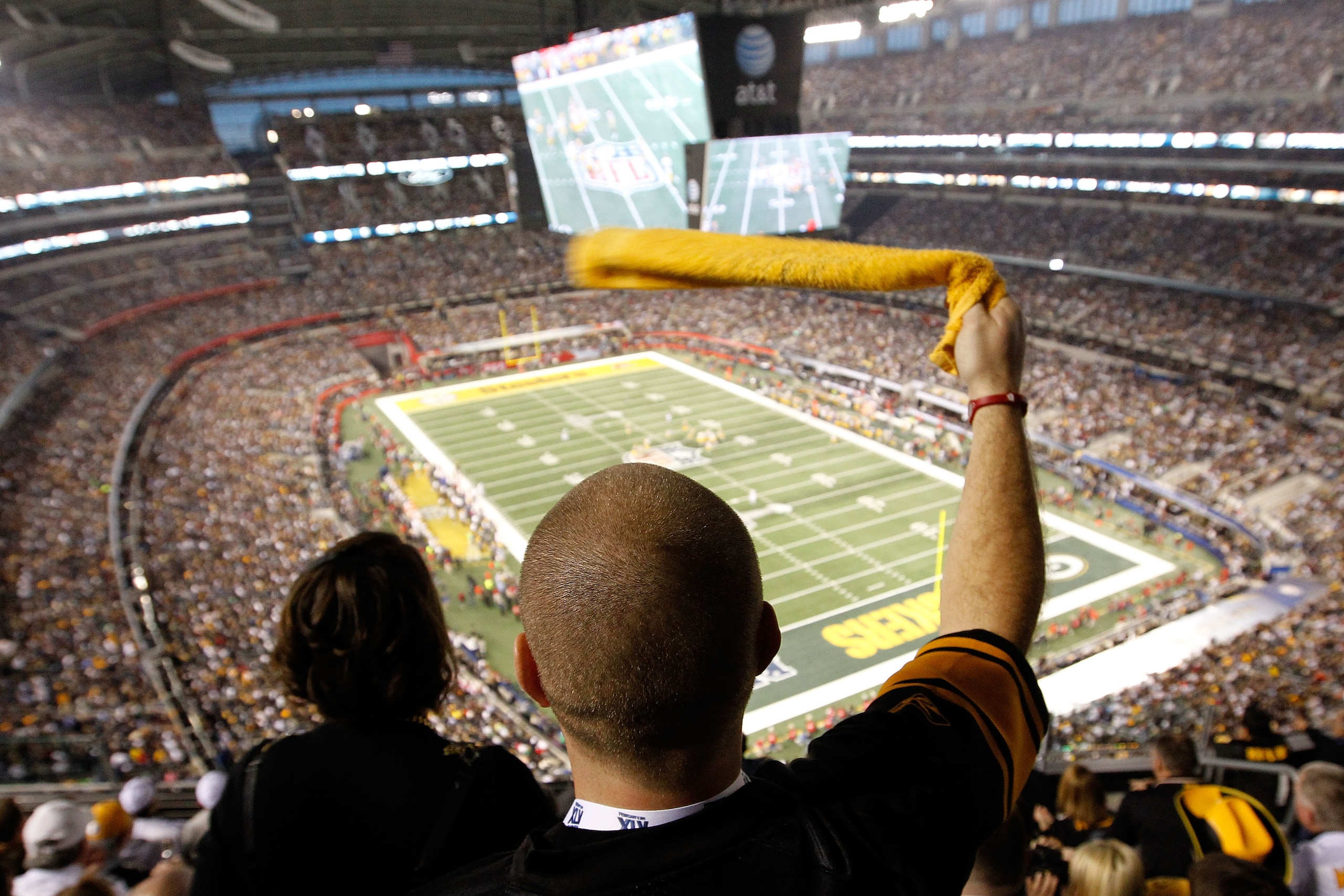 ARLINGTON, TX - FEBRUARY 06:  A Steelers' fan watches the Green Bay Packers take on the Pittsburgh Steelers in Super Bowl XLV at Cowboys Stadium on February 6, 2011 in Arlington, Texas.  (Photo by Tom Pennington/Getty Images)