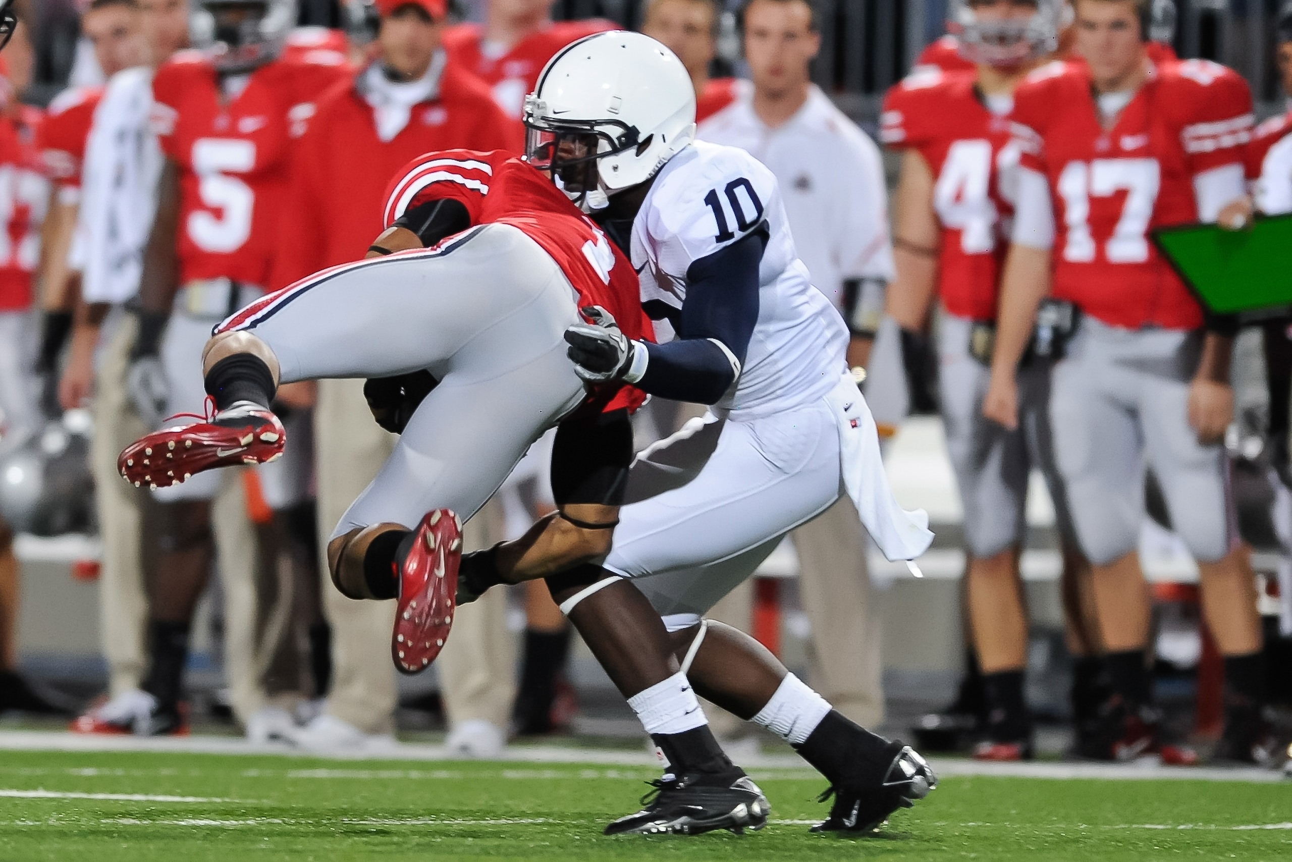 COLUMBUS, OH - NOVEMBER 13:  Malcolm Willis #10 of the Penn State Nittany Lions tackles Dan Herron #1 of the Ohio State Buckeyes at Ohio Stadium on November 13, 2010 in Columbus, Ohio.  (Photo by Jamie Sabau/Getty Images)
