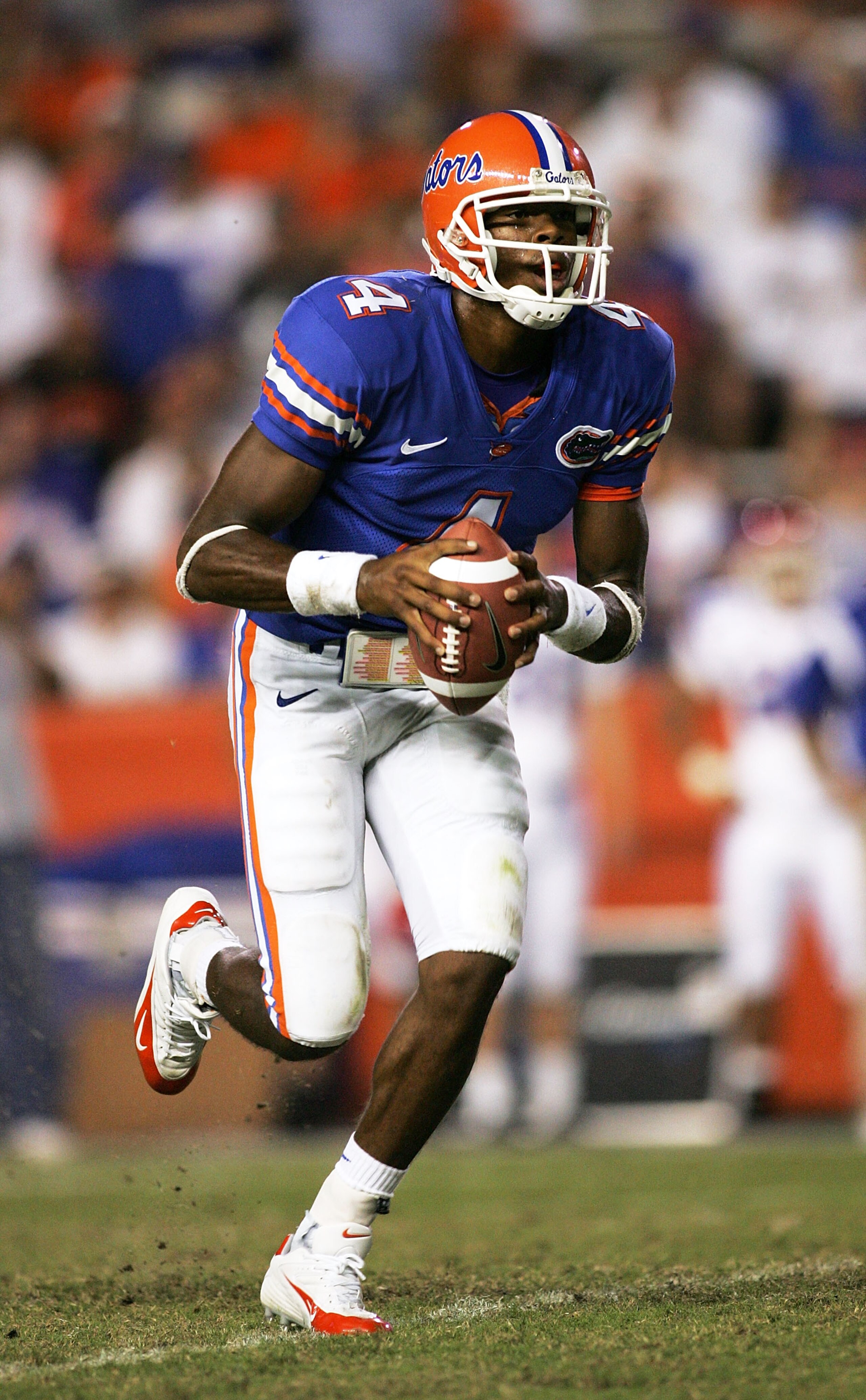 GAINESVILLE, FL - SEPTEMBER 10:  Quarterback Josh Portis #4 of the University of Florida Gators scrambles against the Louisiana Tech Bulldogs at Ben Hill Griffin Stadium on September 10, 2005 in Gainesville, Florida. Florida defeated Louisiana Tech 41-3.