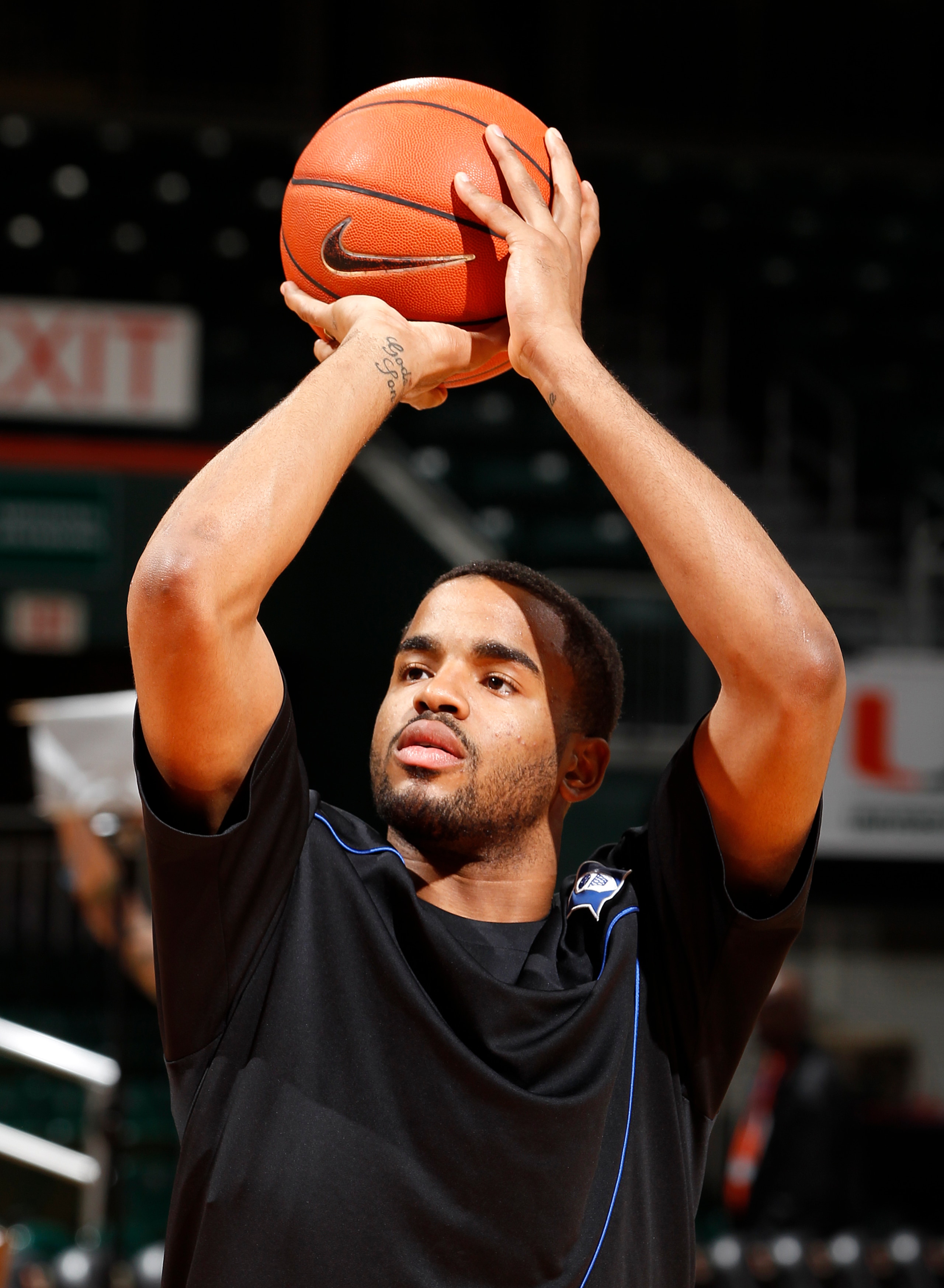 CORAL GABLES, FL - FEBRUARY 13: Josh Hairston #15 of the Duke Blue Devils warms up prior to a game against the Miami Hurricanes on February 13, 2011 at the BankUnited Center in Coral Gables, Florida. (Photo by Joel Auerbach/Getty Images)