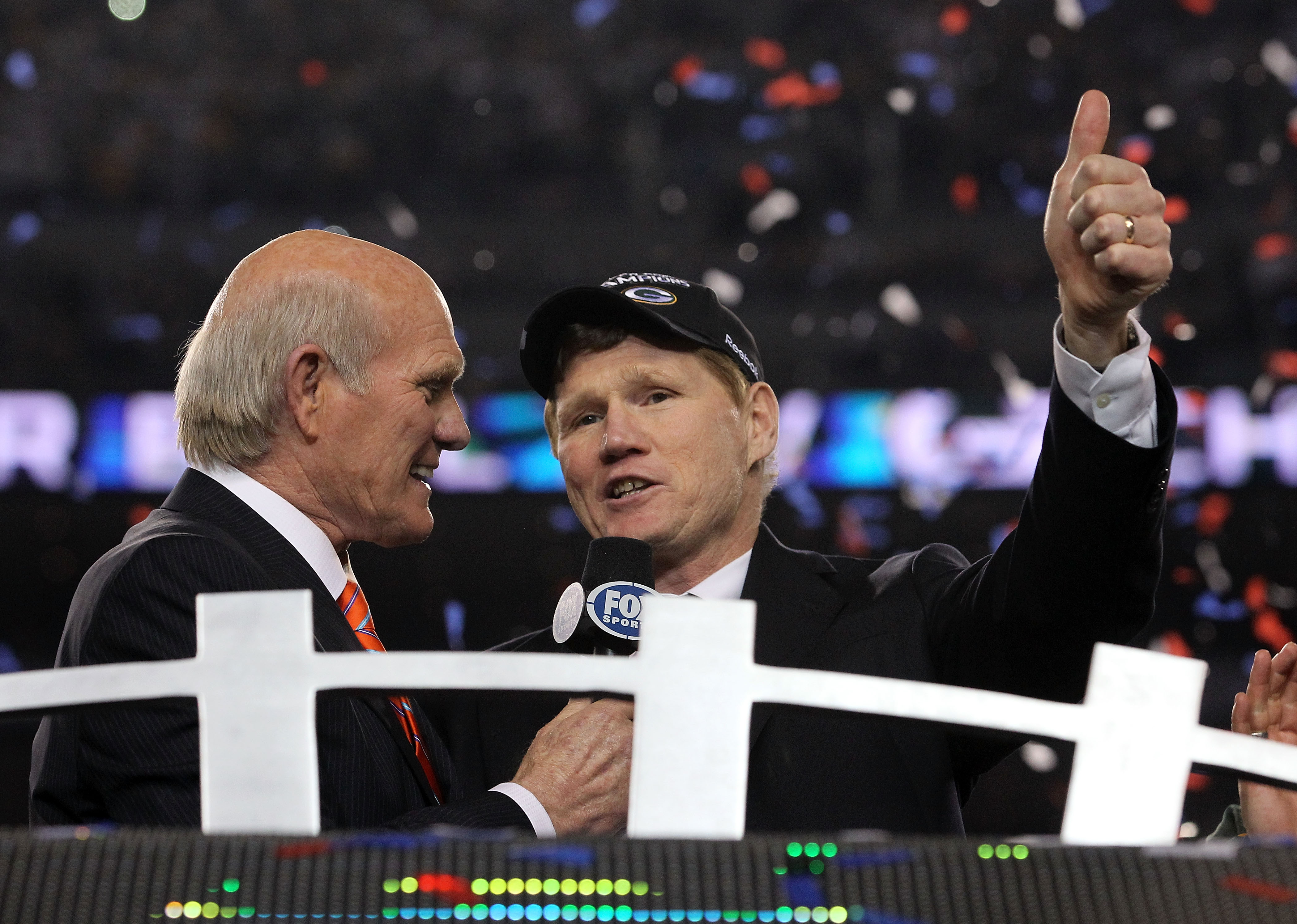 ARLINGTON, TX - FEBRUARY 06:  Fox's Terry Bradshaw interviews the Green Bay Packers President Mark Murphy after the Packers defeated the Pittsburgh Steelers 31-25 during Super Bowl XLV at Cowboys Stadium on February 6, 2011 in Arlington, Texas.  (Photo by