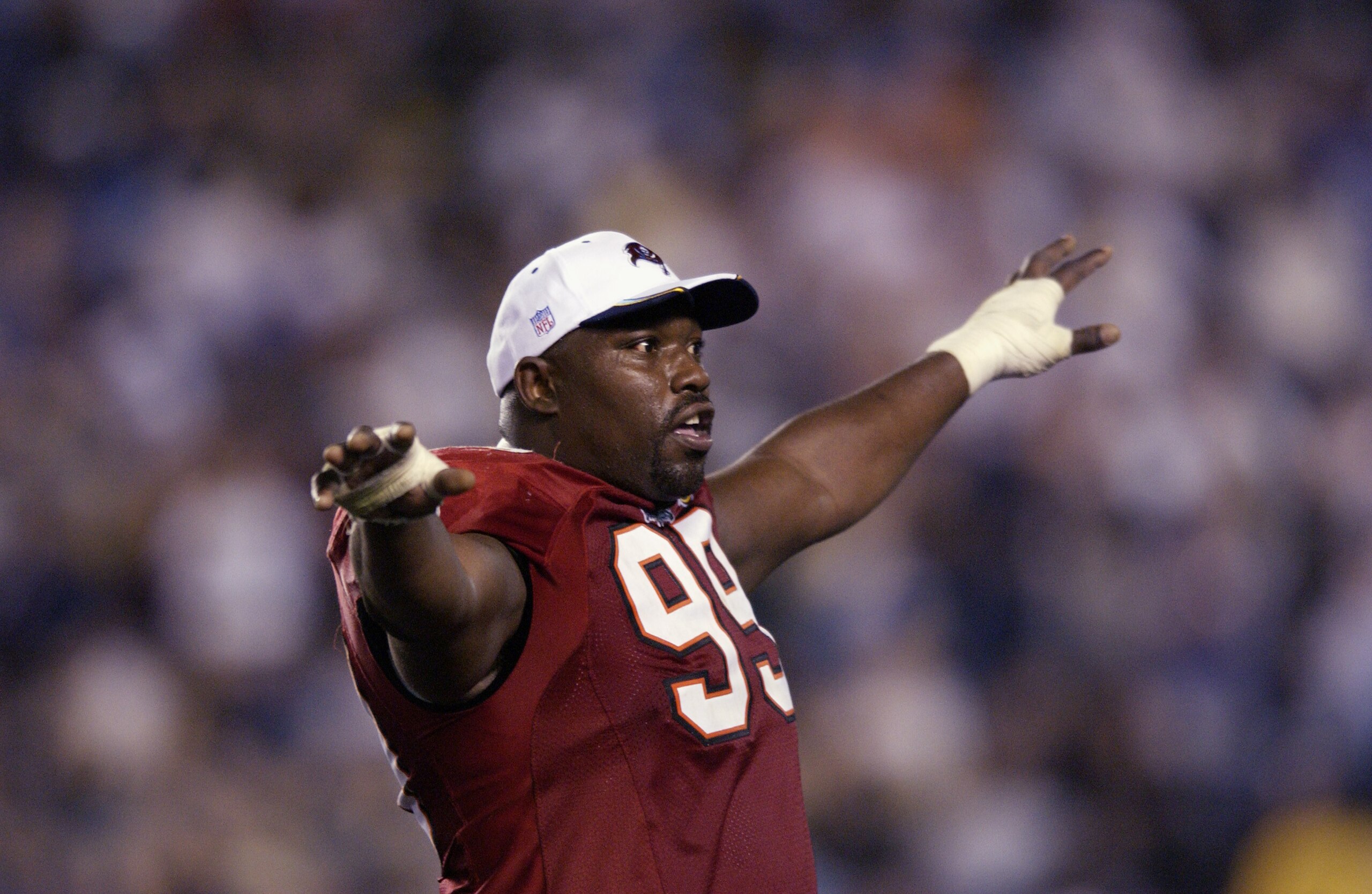 SAN DIEGO - JANUARY 26:  Warren Sapp #99 of the Tampa Bay Buccaneers celebrates the victory over the Oakland Raiders in Super Bowl XXXVII on January 26, 2003 at Qualcomm Stadium in San Diego, California.  The Buccaneers won 48-21.  (Photo by Ezra Shaw/Get