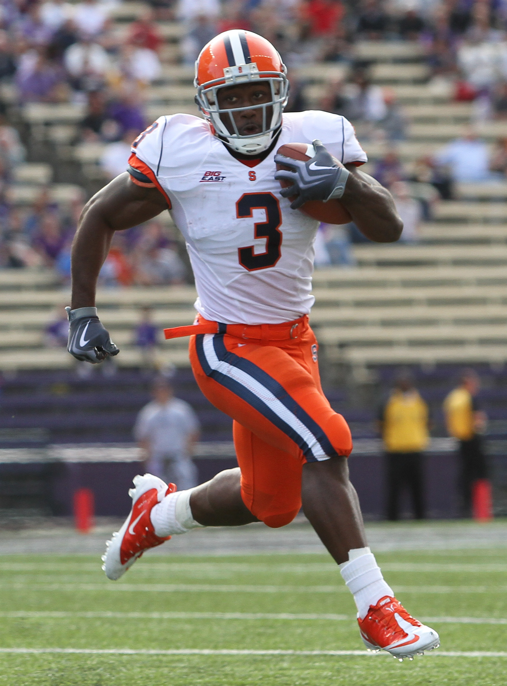 SEATTLE - SEPTEMBER 11:  Running back Delone Carter #3 of the Syracuse Orange rushes against the Washington Huskies on September 11, 2010 at Husky Stadium in Seattle, Washington. (Photo by Otto Greule Jr/Getty Images)
