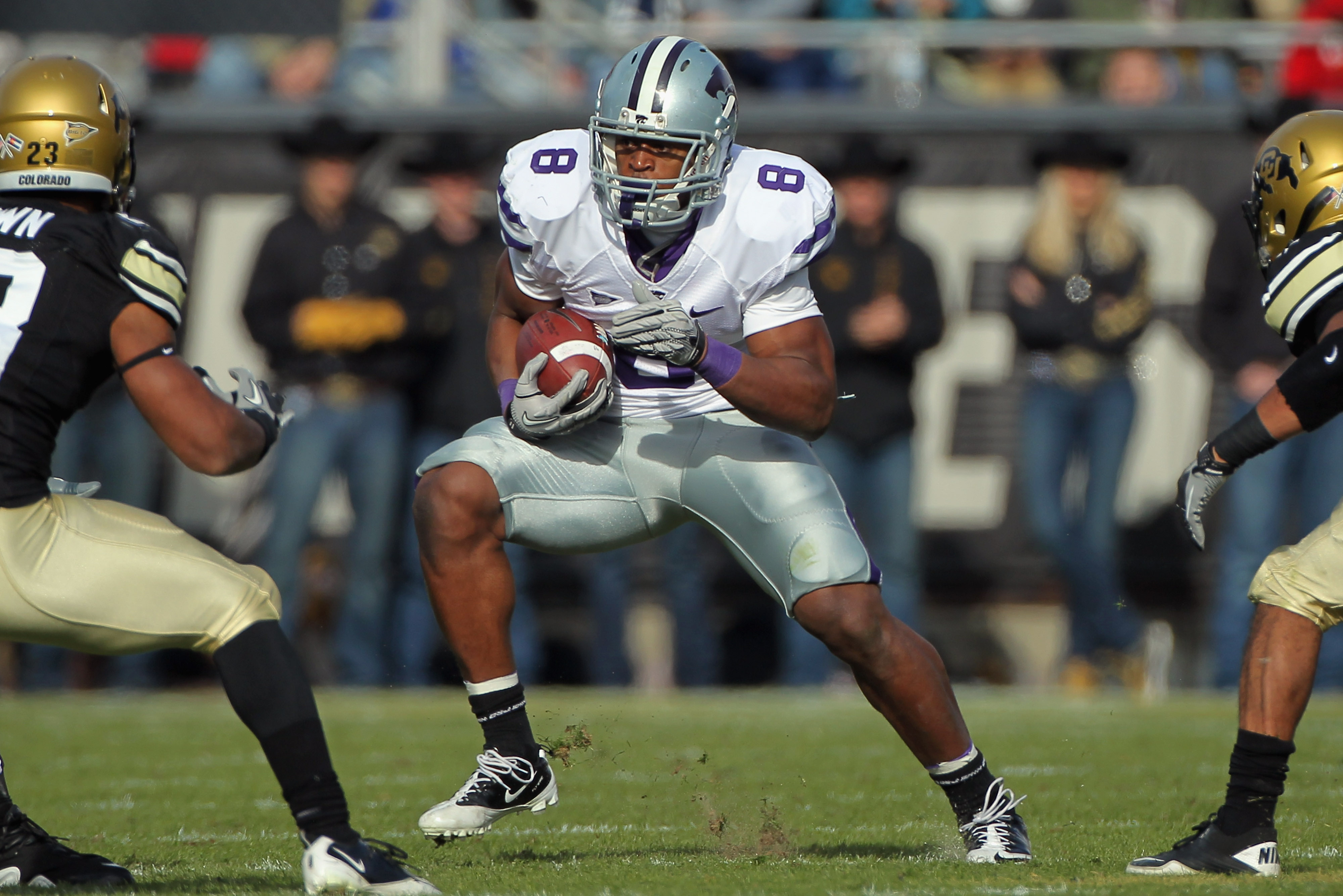 BOULDER, CO - NOVEMBER 20:  Daniel Thomas #8 of the Kansas State Wildcats rushes with the ball against the Colorado Buffaloes at Folsom Field on November 20, 2010 in Boulder, Colorado. Colorado defeated Kansas State 44-36.  (Photo by Doug Pensinger/Getty