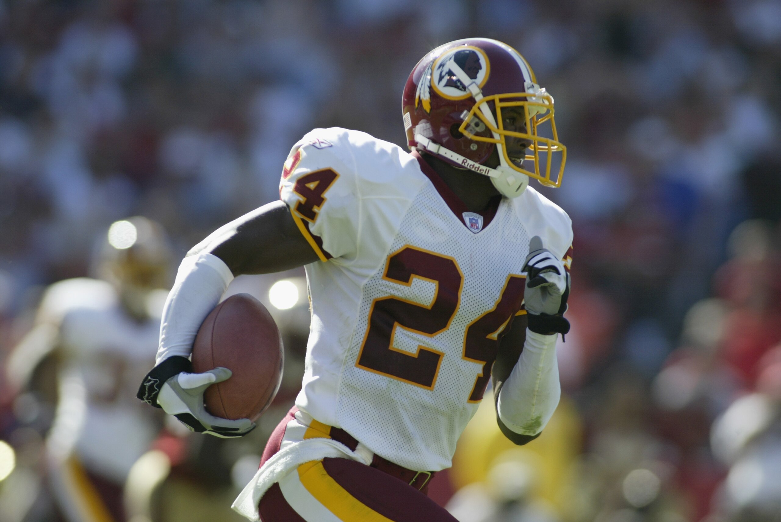 SAN FRANCISCO - SEPTEMBER 22:  Cornerback Champ Bailey #24 of the Washington Redskins runs the ball against the San Francisco 49ers during the NFL game on September 22, 2002 at Candlestick Park in San Francisco, California.  The 49er's won 20-10.  (Photo