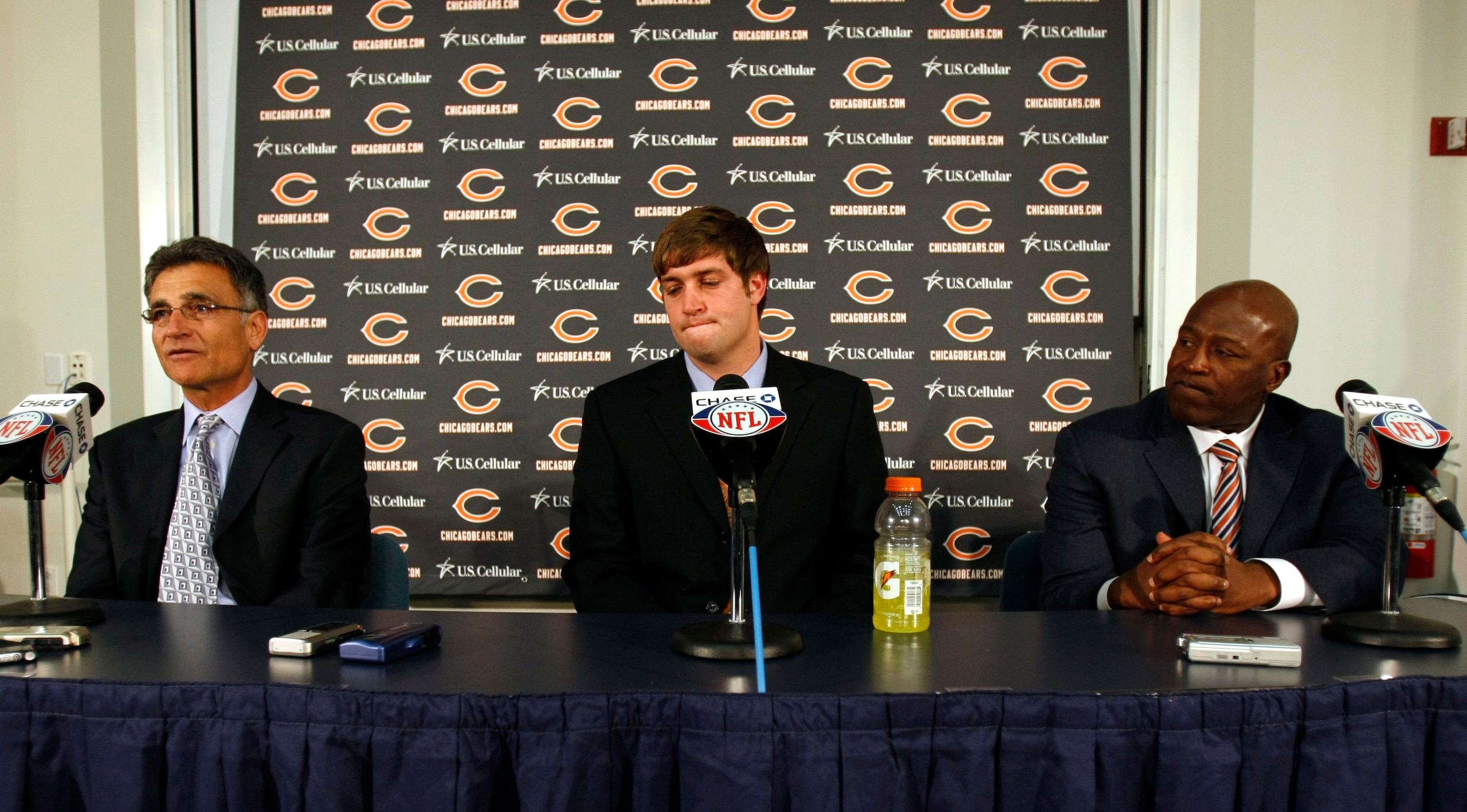 LAKE FOREST, IL - APRIL 3: General Manager Jerry Angelo (L) of the Chicago Bears looks on along with head coach Lovie Smith (R) as they introduce Jay Cutler as their new quarterback during a press conference on April 3, 2009 at Halas Hall in Lake Forest, 