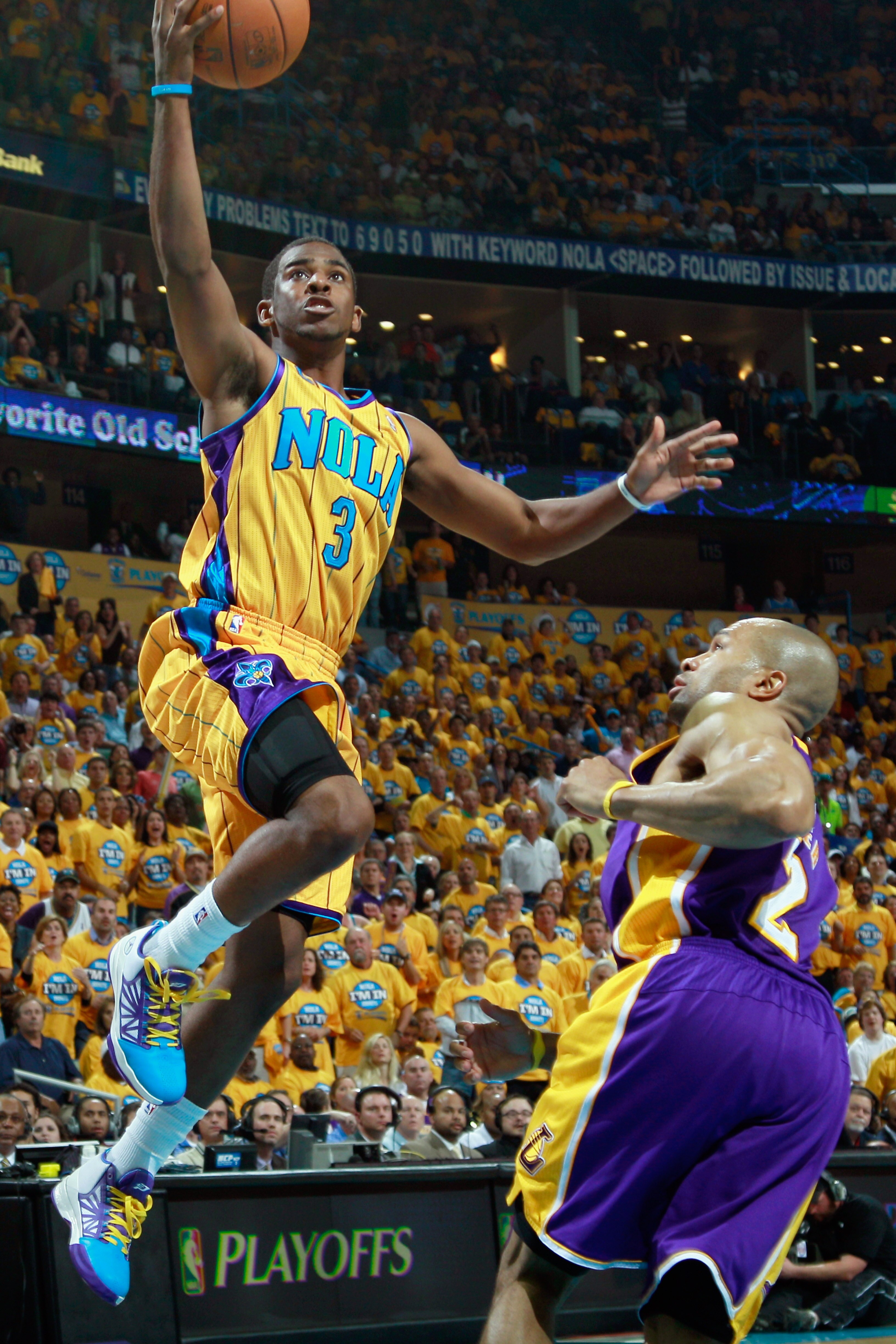 NEW ORLEANS, LA - APRIL 22:  Chris Paul #3 of the New Orleans Hornets shoots the ball over Derek Fisher #2  of the Los Angeles Lakers in Game Three of the Western Conference Quarterfinals in the 2011 NBA Playoffs at the New Orleans Arena  on April 22, 201