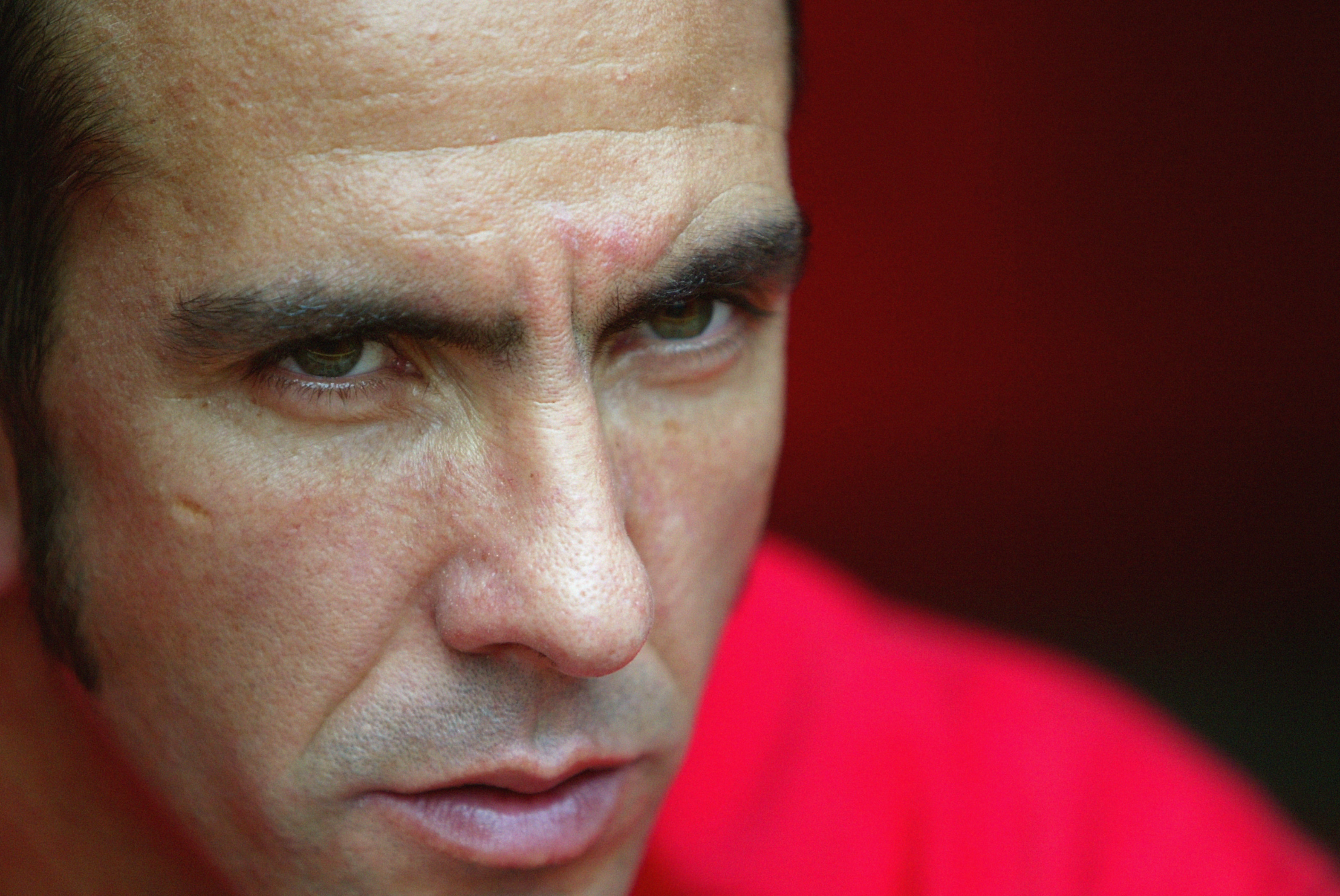 LONDON - SEPTEMBER 28:  Paolo Di Canio of Charlton Athletic looks on from the substitutes bench during the FA Barclaycard Premiership match between Charlton Athletic and Liverpool held on September 28, 2003 at The Valley, in London. Charlton Athletic won
