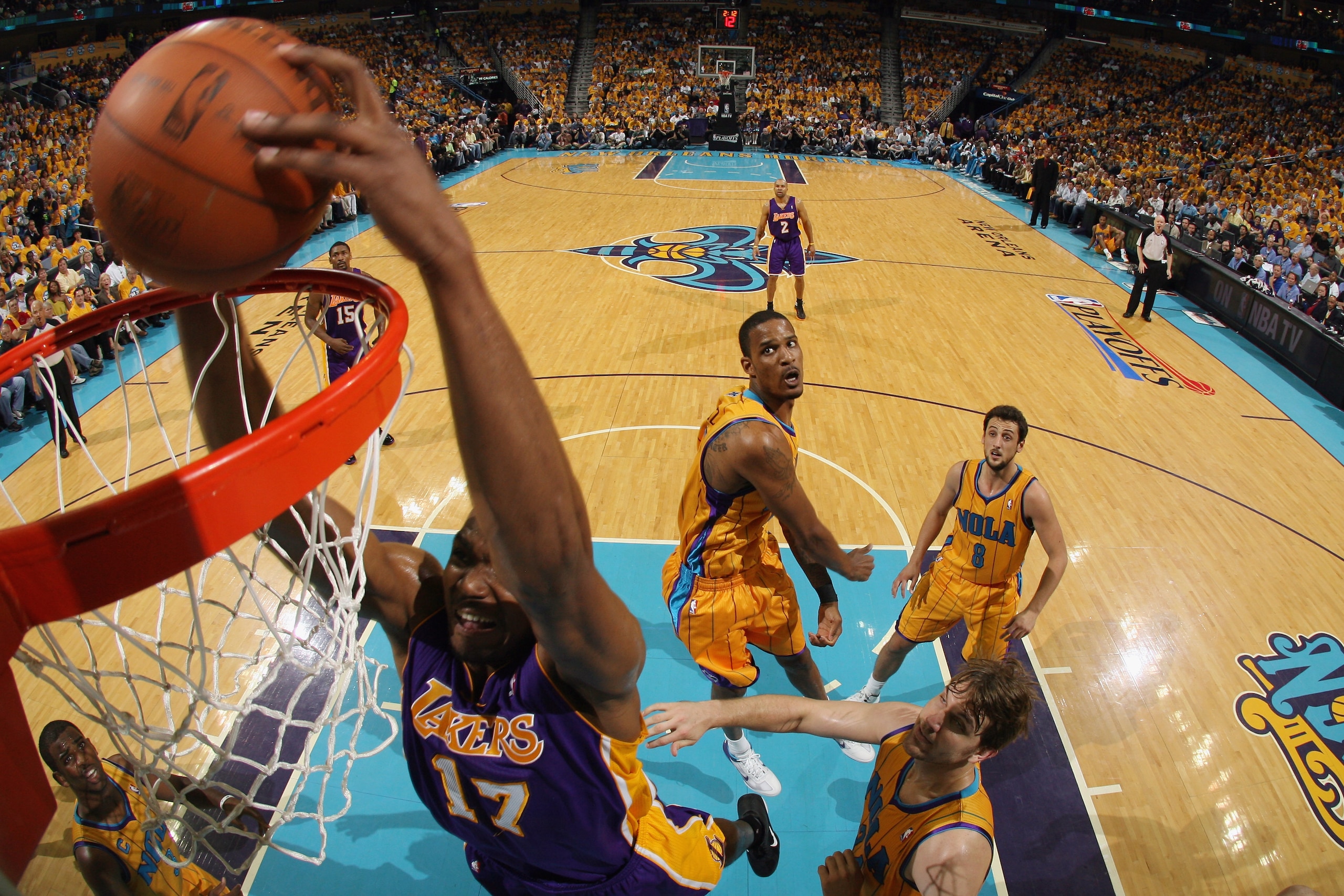 NEW ORLEANS, LA - APRIL 22: Andrew Bynum #17 of the Los Angeles Lakers dunks the ball during the game against the New Orleans Hornets in Game Three of the Western Conference Quarterfinals in the 2011 NBA Playoffs at the New Orleans Arena on April 22, 20 NEW ORLEANS, LA - APRIL 22: Andrew Bynum #17 of the Los Angeles Lakers dunks the ball during the game against the New Orleans Hornets in Game Three of the Western Conference Quarterfinals in the 2011 NBA Playoffs at the New Orleans Arena on April 22, 20
