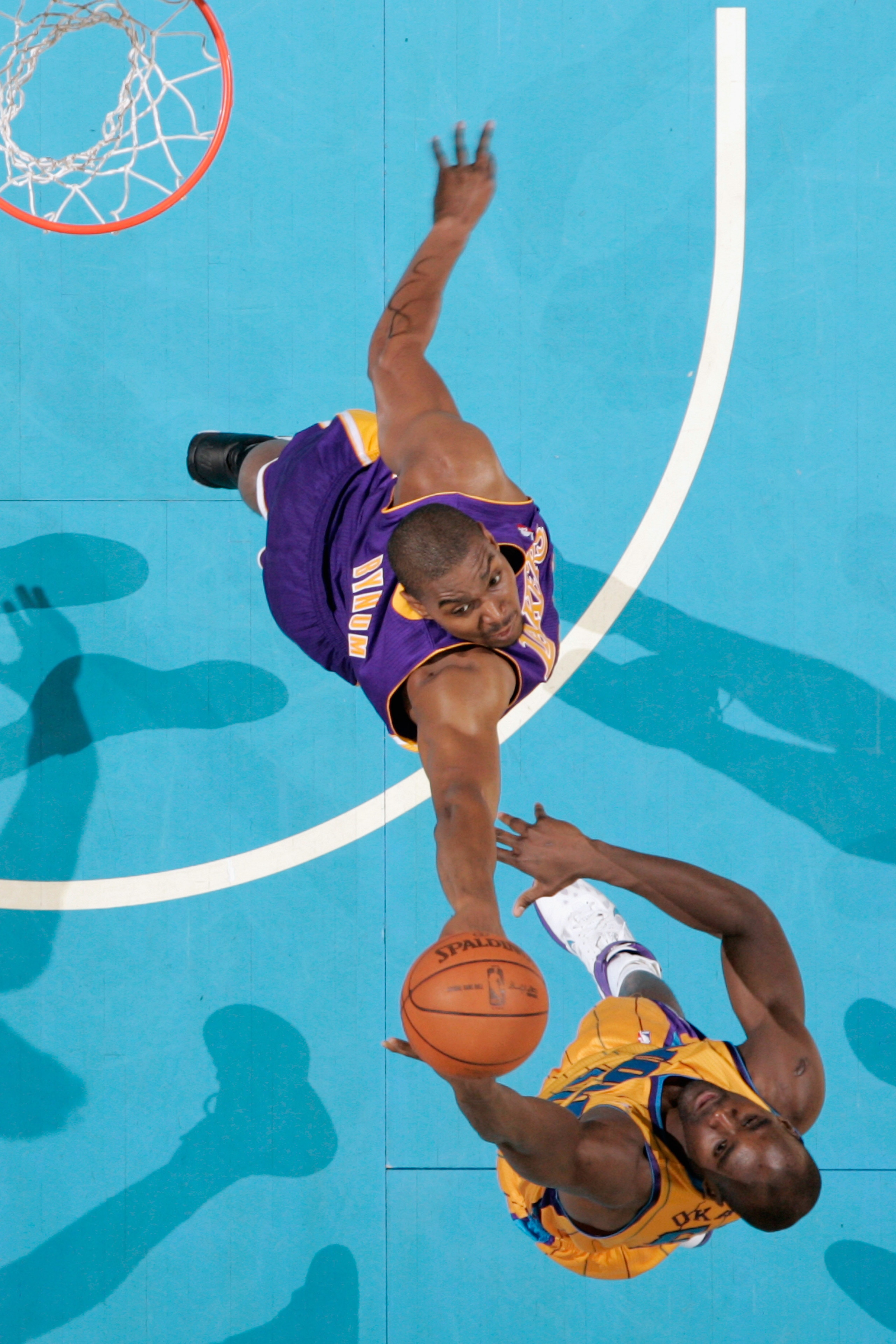 NEW ORLEANS, LA - APRIL 22: Emeka Okafor #50 of the New Orleans Hornets shoots the ball over Andrew Bynum #17 of the Los Angeles Lakers in Game Three of the Western Conference Quarterfinals in the 2011 NBA Playoffs at the New Orleans Arena on April 22, NEW ORLEANS, LA - APRIL 22: Emeka Okafor #50 of the New Orleans Hornets shoots the ball over Andrew Bynum #17 of the Los Angeles Lakers in Game Three of the Western Conference Quarterfinals in the 2011 NBA Playoffs at the New Orleans Arena on April 22,