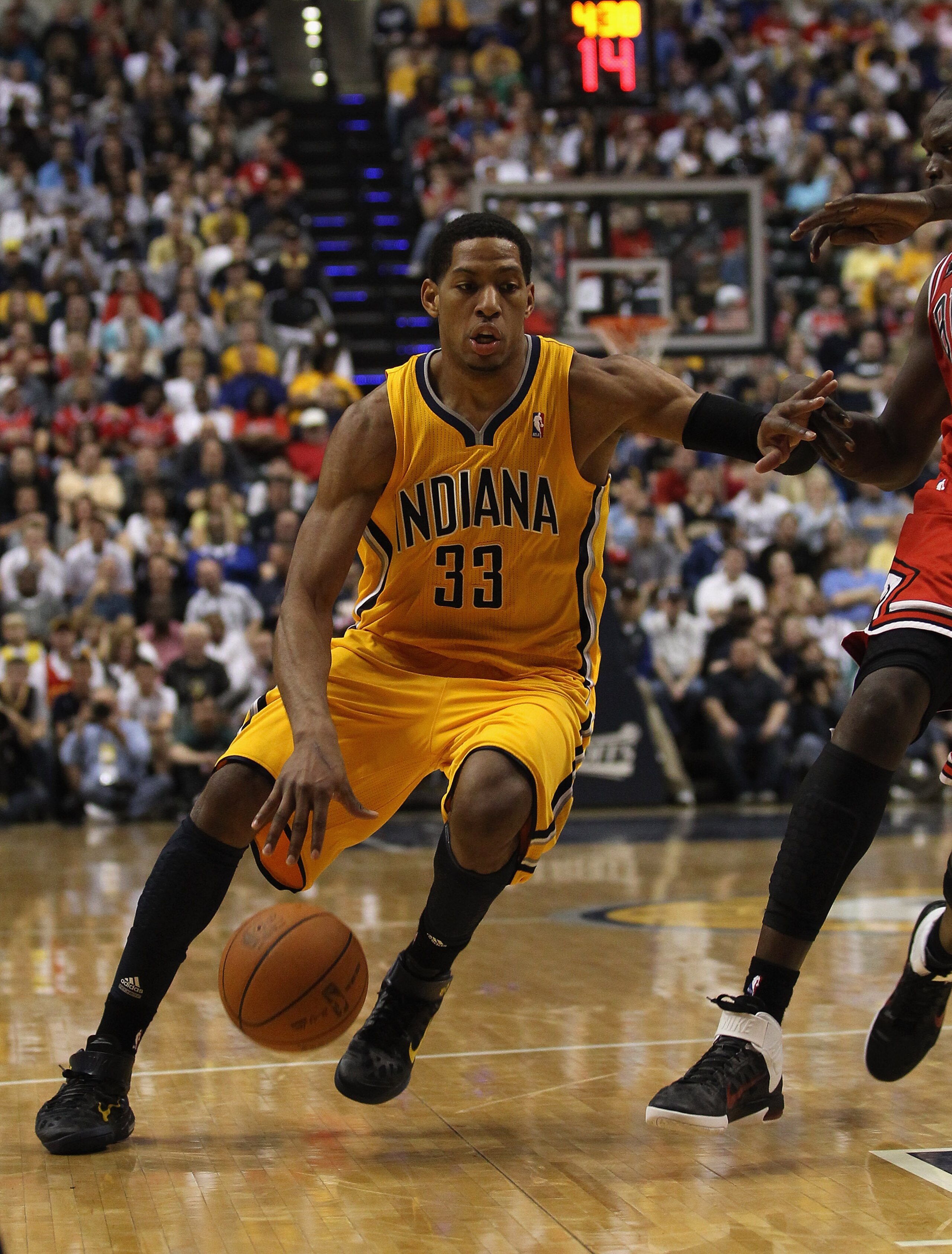 INDIANAPOLIS, IN - APRIL 23: Danny Granger #33 of the Indiana Pacers drives against the Chicago Bulls in Game Four of the Eastern Conference Quarterfinals in the 2011 NBA Playoffs at Conseco Fieldhouse on April 23, 2011 in Indianapolis, Indiana. The Pacer