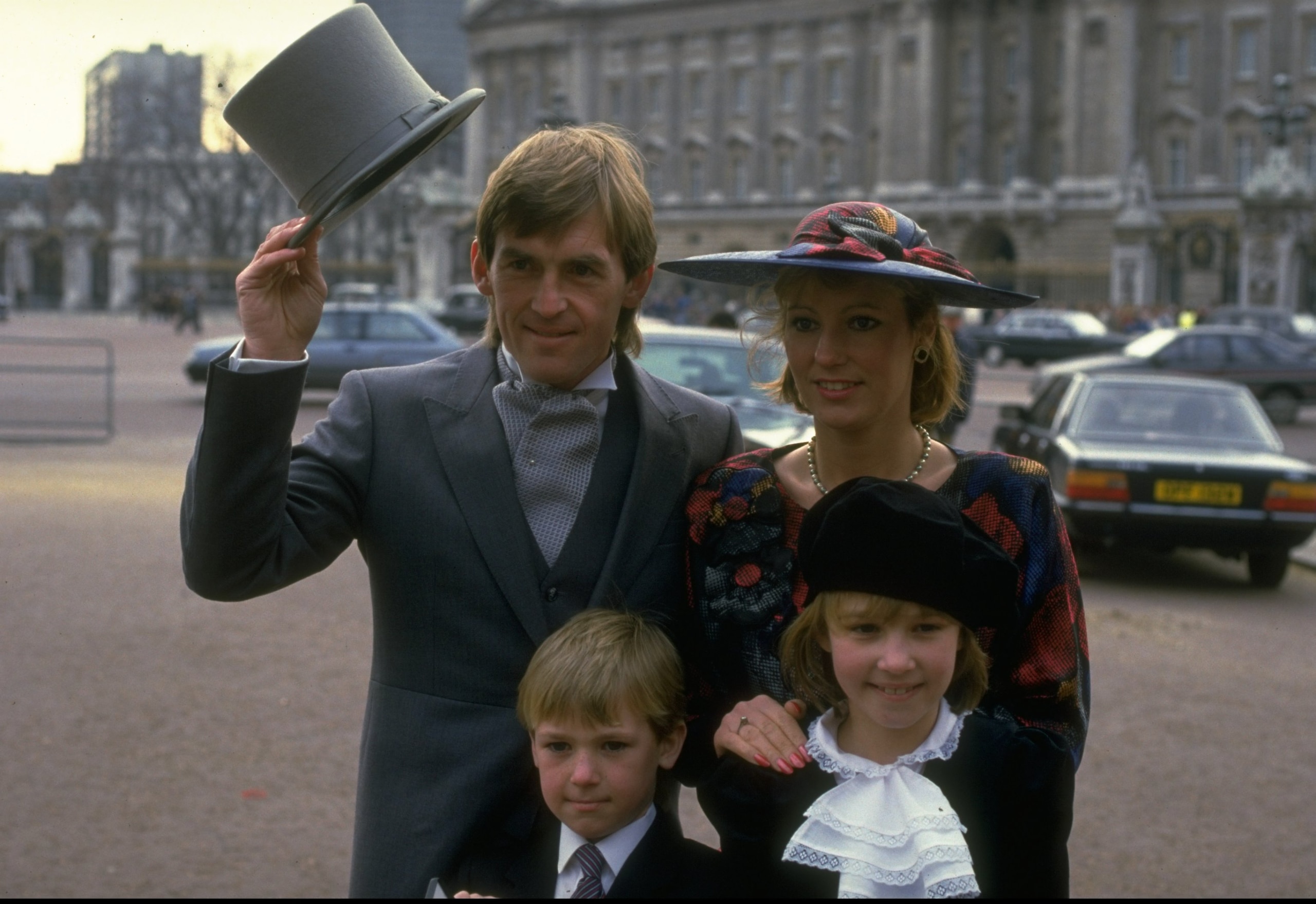 Undated:  Kenny Dalglish of Scotland poses for photographers with his family after receiving his MBE at Buckingham Palace in London.  \ Mandatory Credit: Mike  Powell/Allsport
