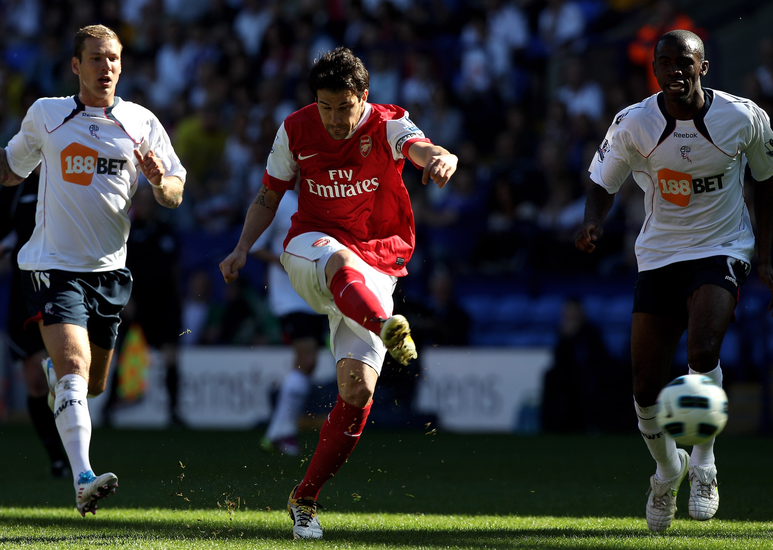 BOLTON, ENGLAND - APRIL 24:   Cesc Fabregas of Arsenal shoots at goal during the Barclays Premier League match between Bolton Wanderers and Arsenal at the Reebok Stadium on April 24, 2011 in Bolton, England. (Photo by Michael Steele/Getty Images)