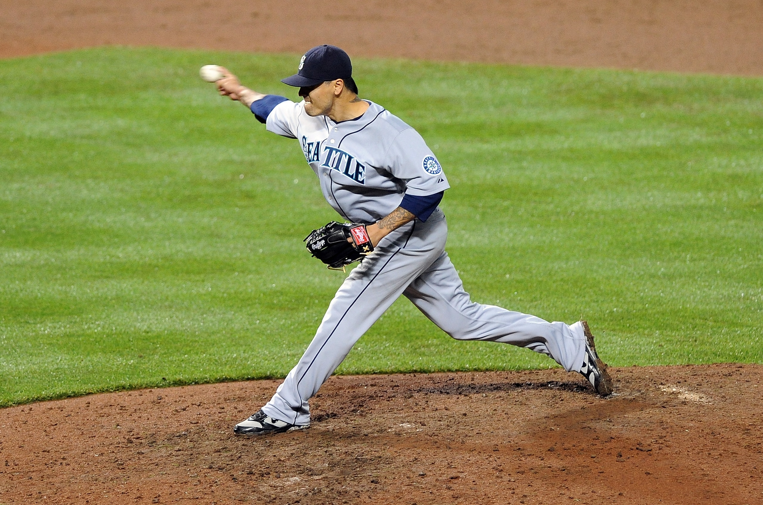 BALTIMORE - MAY 11:  Brandon League #43 of the Seattle Mariners pitches against the Baltimore Orioles at Camden Yards on May 11, 2010 in Baltimore, Maryland.  (Photo by Greg Fiume/Getty Images)
