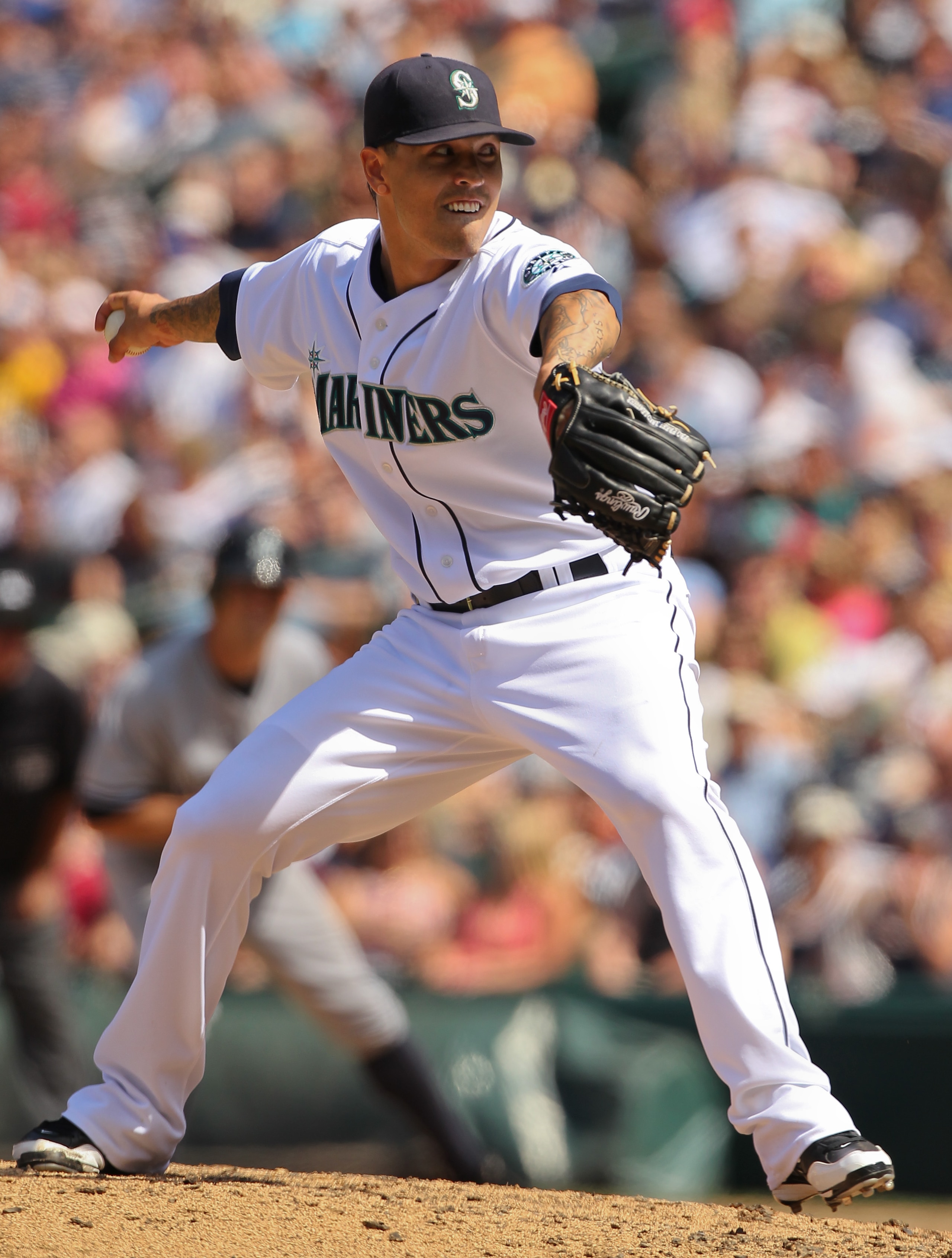 SEATTLE - JULY 11:  Relief pitcher Brandon League #43 of the Seattle Mariners pitches against the New York Yankees at Safeco Field on July 11, 2010 in Seattle, Washington. (Photo by Otto Greule Jr/Getty Images)