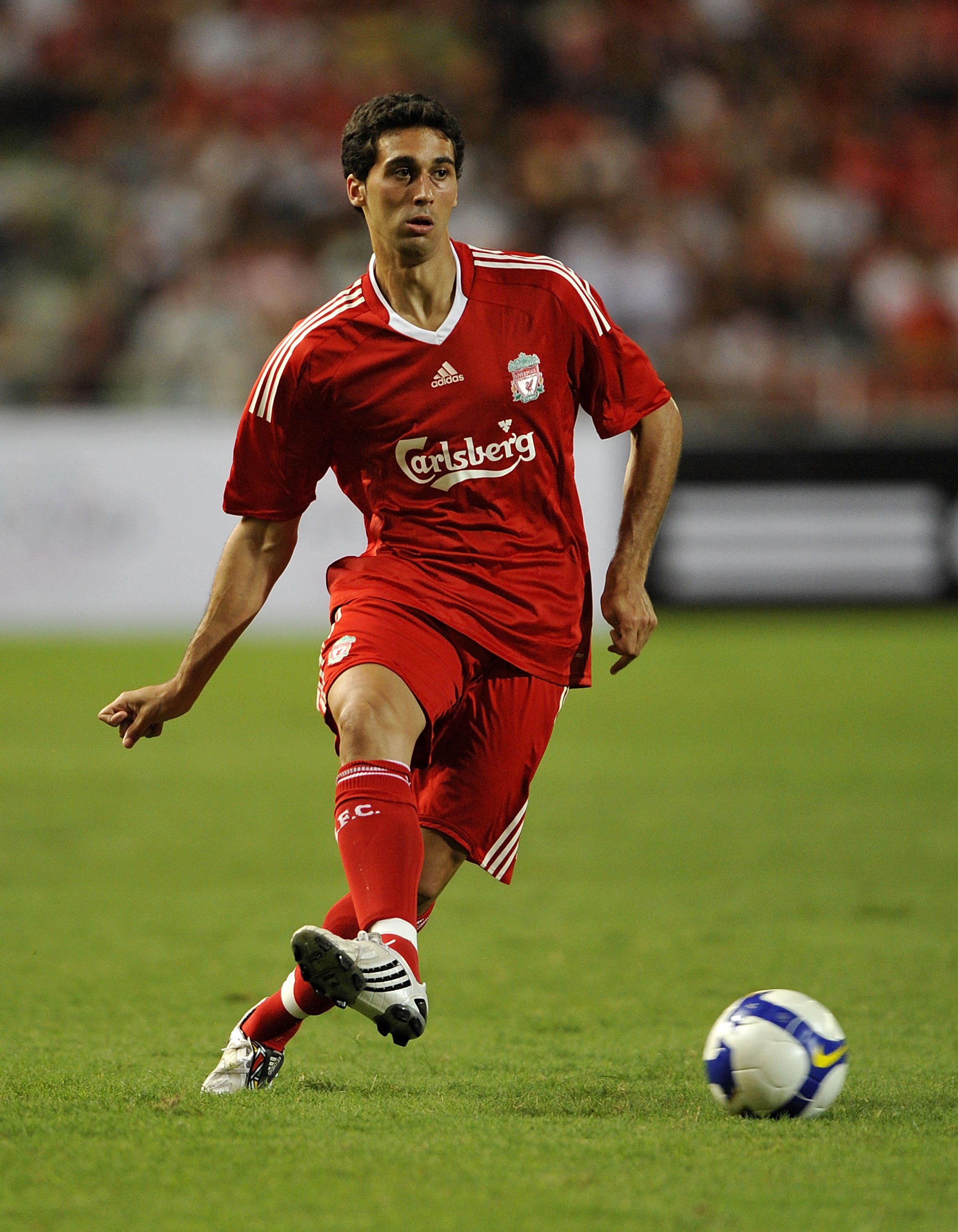 BANGKOK, THAILAND - JULY 22:  Alvaro Arbeloa of Liverpool in action during a pre-season friendly match againts Thailand at the Rajamangala National Stadium on July 22, 2009 in Bangkok, Thailand.  (Photo by Victor Fraile/Getty Images)