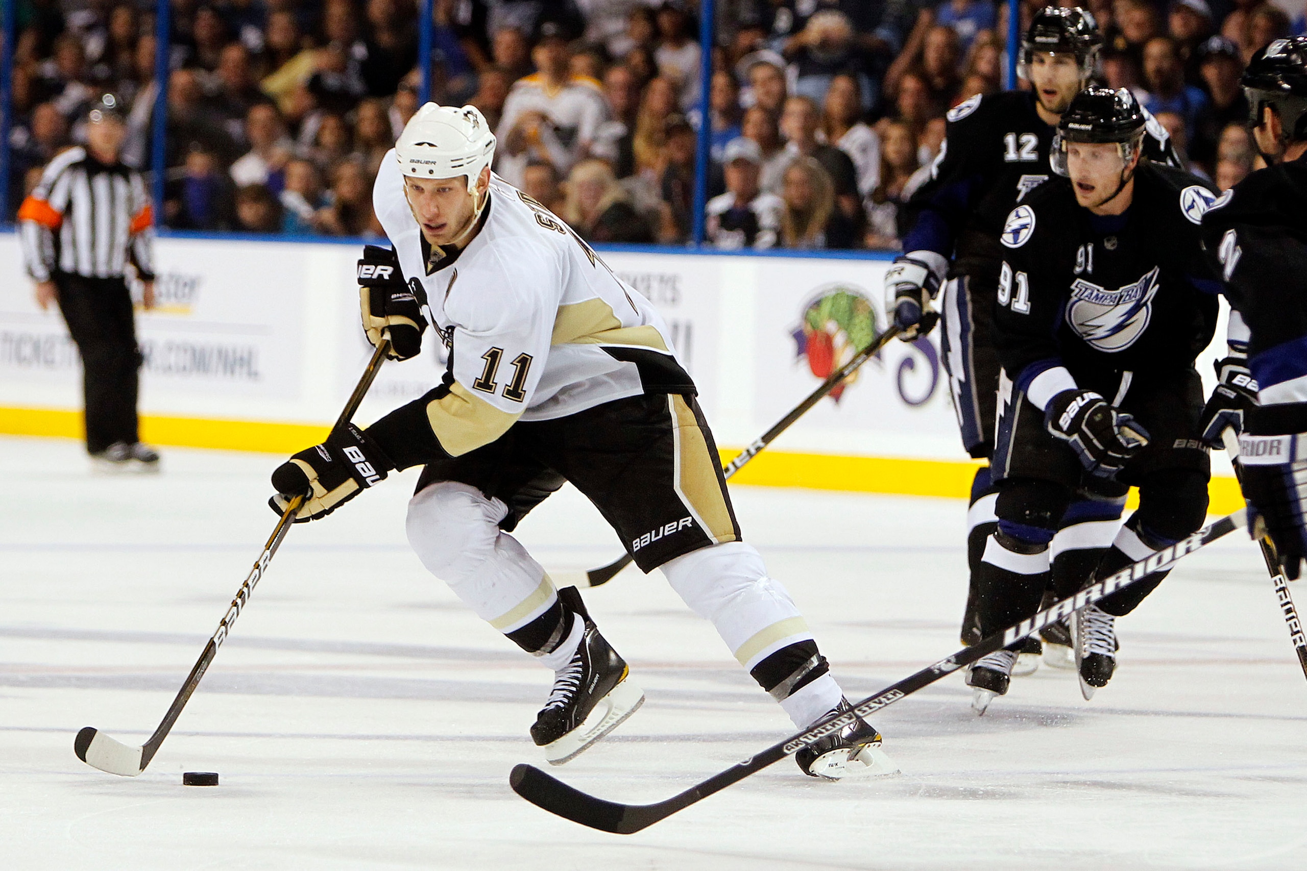 TAMPA, FL - APRIL 18: Jordan Staal #11 of the Pittsburgh Penguins skates with the puck against the Tampa Bay Lightning in Game Three of the Eastern Conference Quarterfinals during the 2011 NHL Stanley Cup Playoffs at the St. Pete Times Forum on April 18,