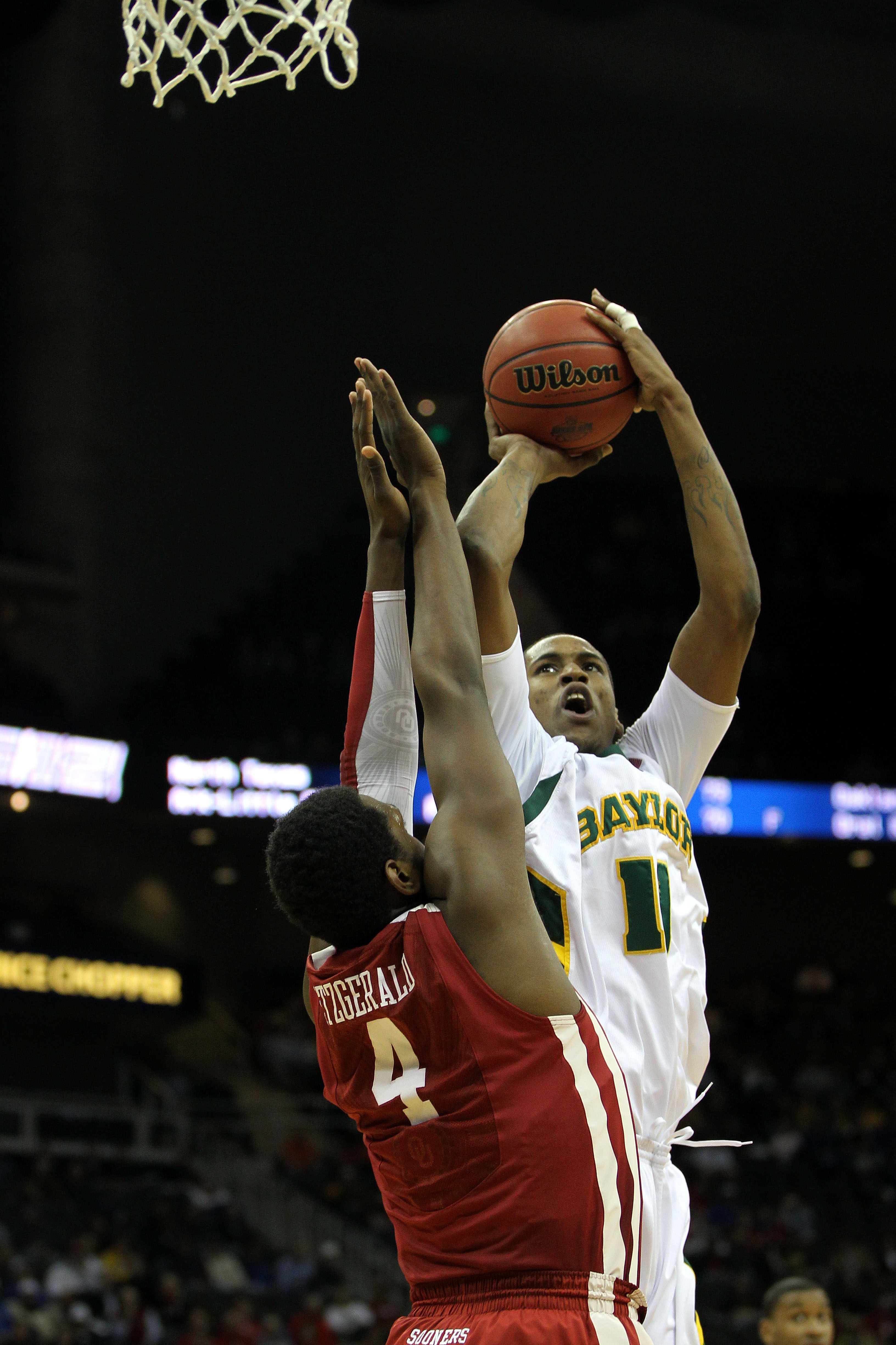 KANSAS CITY, MO - MARCH 09:  J'mison Morgan #11 of the Baylor Bears takes a shot against the Oklahoma Sooners during their game in the first round of the 2011 Phillips 66 Big 12 Men's Basketball Tournament at Sprint Center on March 9, 2011 in Kansas City,