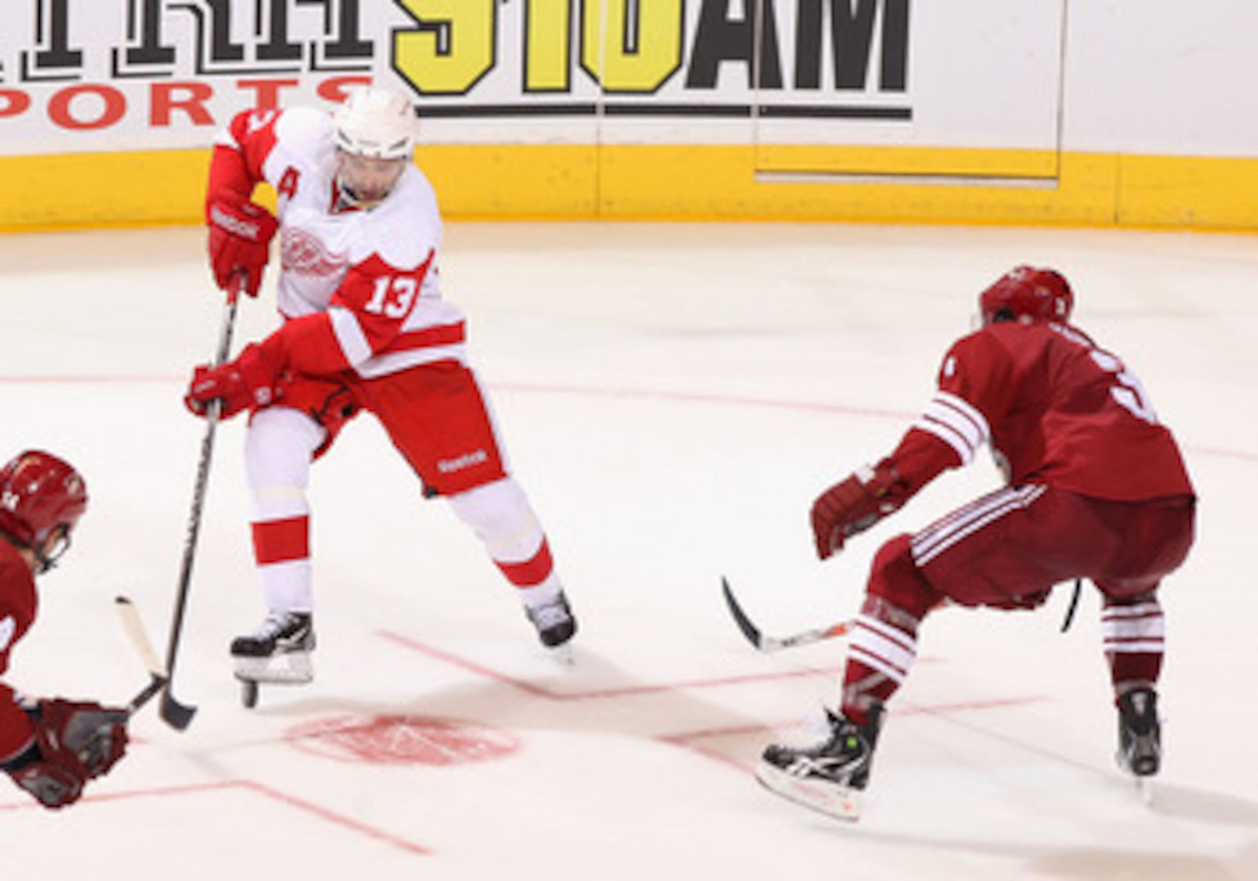 GLENDALE, AZ - APRIL 18:  Pavel Datsyuk #13 of the Detroit Red Wings skates with the puck in Game Three of the Western Conference Quarterfinals against the Phoenix Coyotes during the 2011 NHL Stanley Cup Playoffs at Jobing.com Arena on April 18, 2011 in G