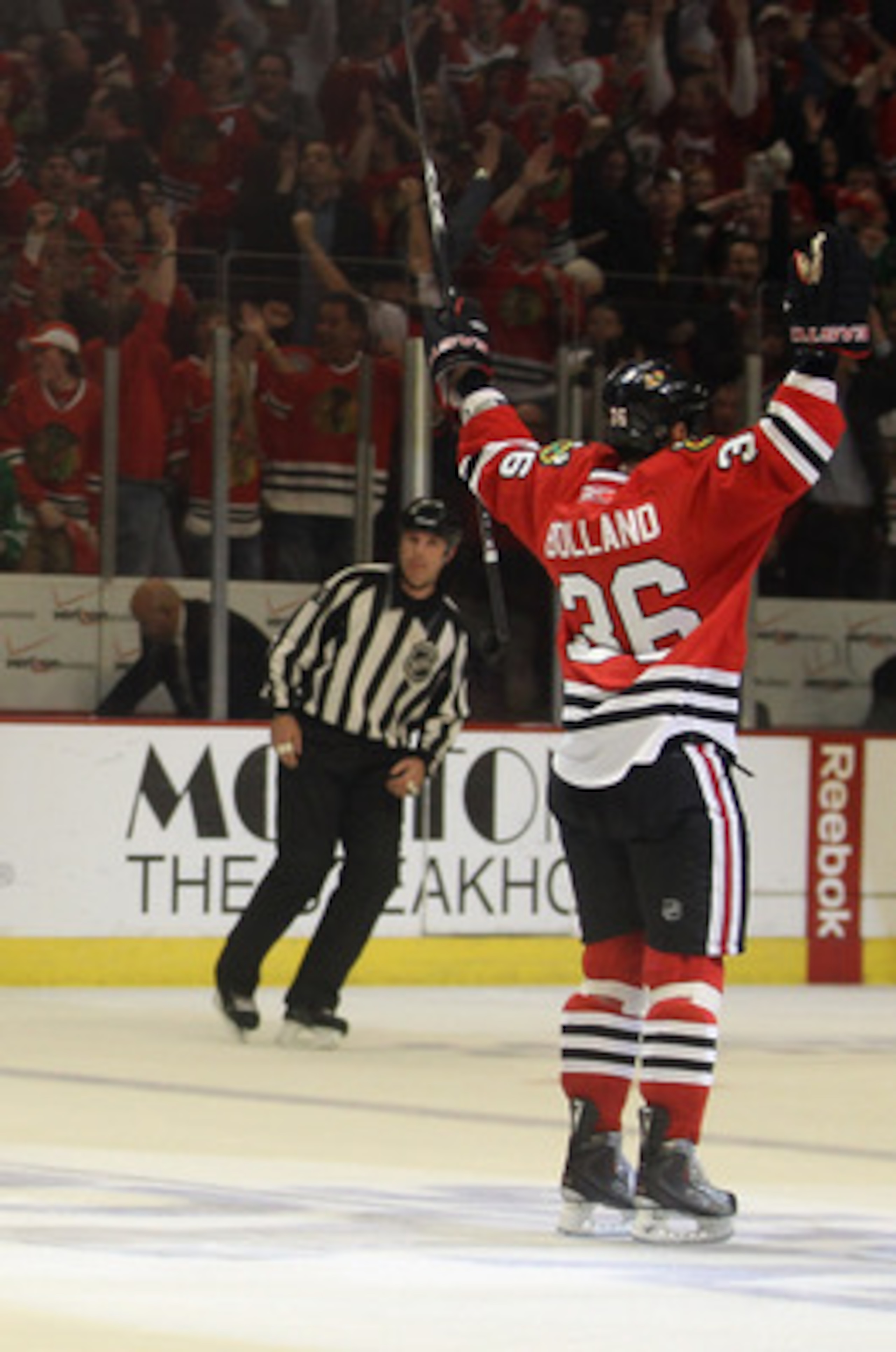 CHICAGO, IL - APRIL 24: Dave Bolland #36 of the Chicago Blackhawks celebrates his 2nd period goal with teammate Duncan Keith #2 against the Vancouver Canucks in Game Six of the Western Conference Quarterfinals during the 2011 NHL Stanley Cup Playoffs at t