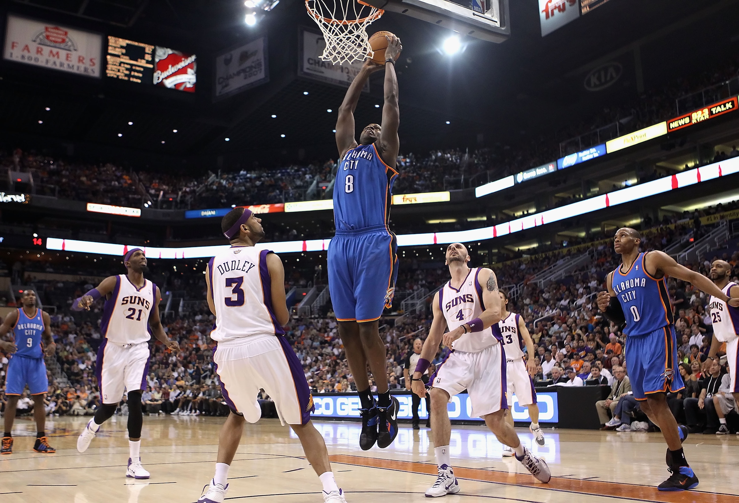 PHOENIX, AZ - MARCH 30:  Nazr Mohammed #8 of the Oklahoma City Thunder slam dunks the ball against the Phoenix Suns during the NBA game at US Airways Center on March 30, 2011 in Phoenix, Arizona.  NOTE TO USER: User expressly acknowledges and agrees that,