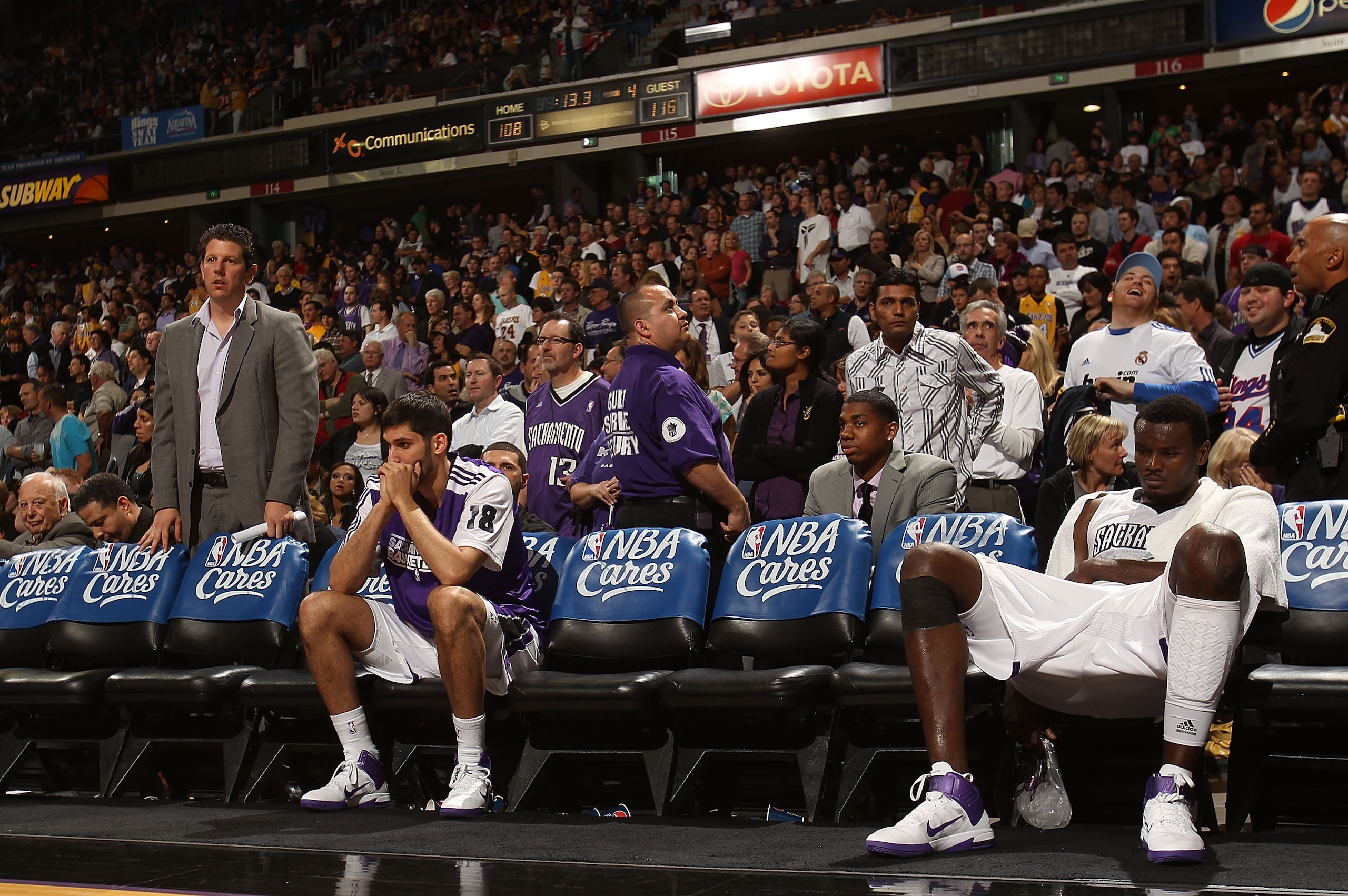 SACRAMENTO, CA - APRIL 13:  Omri Casspi #18 and Samuel Dalembert #10 of the Sacramento Kings look on against the Los Angeles Lakers on April 13, 2011 at Power Balence Pavilion in Sacramento, California. NOTE TO USER: User expressly acknowledges and agrees