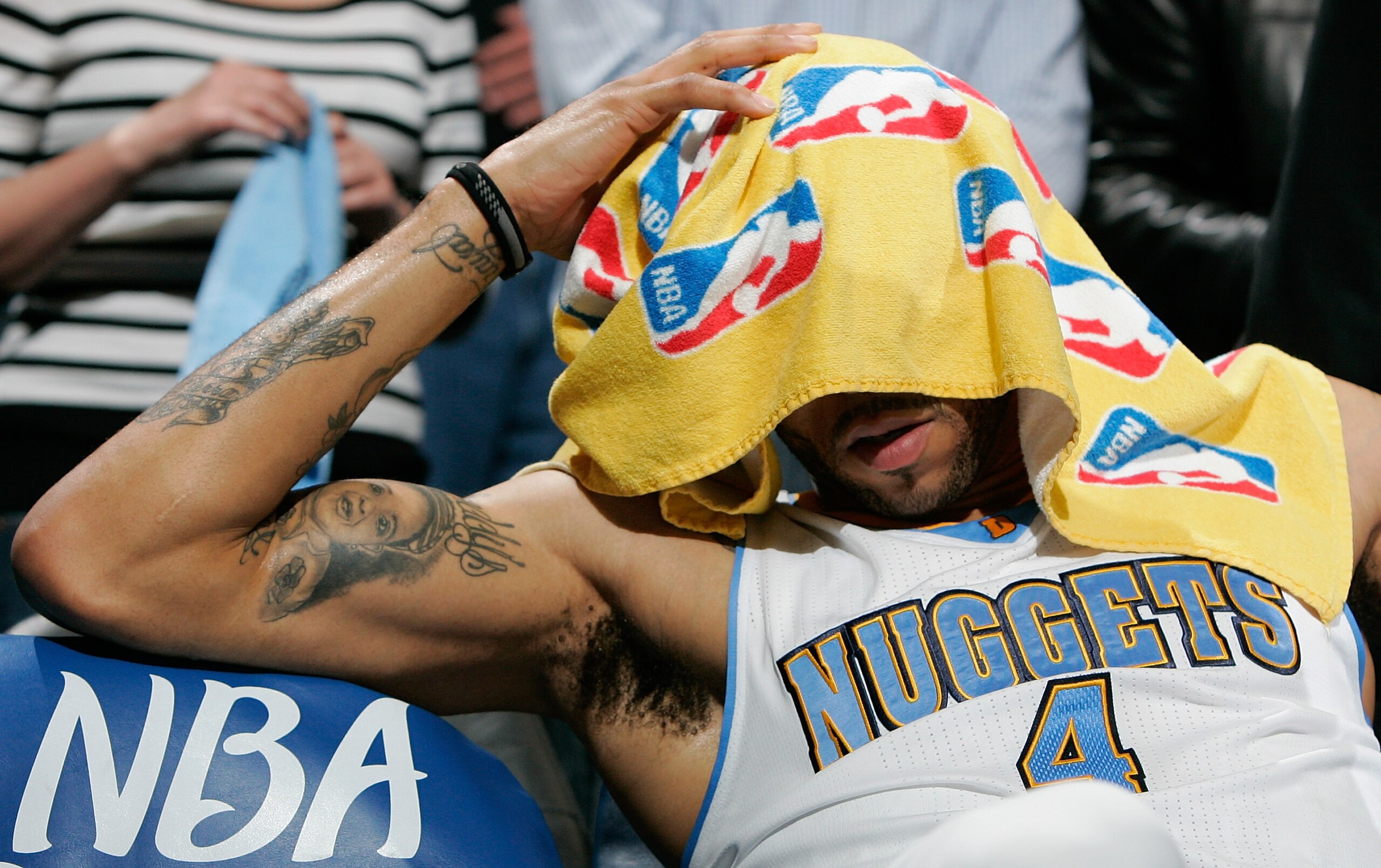 DENVER, CO - APRIL 23:  Kenyon Martin #4 of the Denver Nuggets sits frustrated on the sidelines during a 97-94 loss to the Oklahoma City Thunder in Game Three of the Western Conference Quarterfinals in the 2011 NBA Playoffs at Pepsi Center on April 23, 20