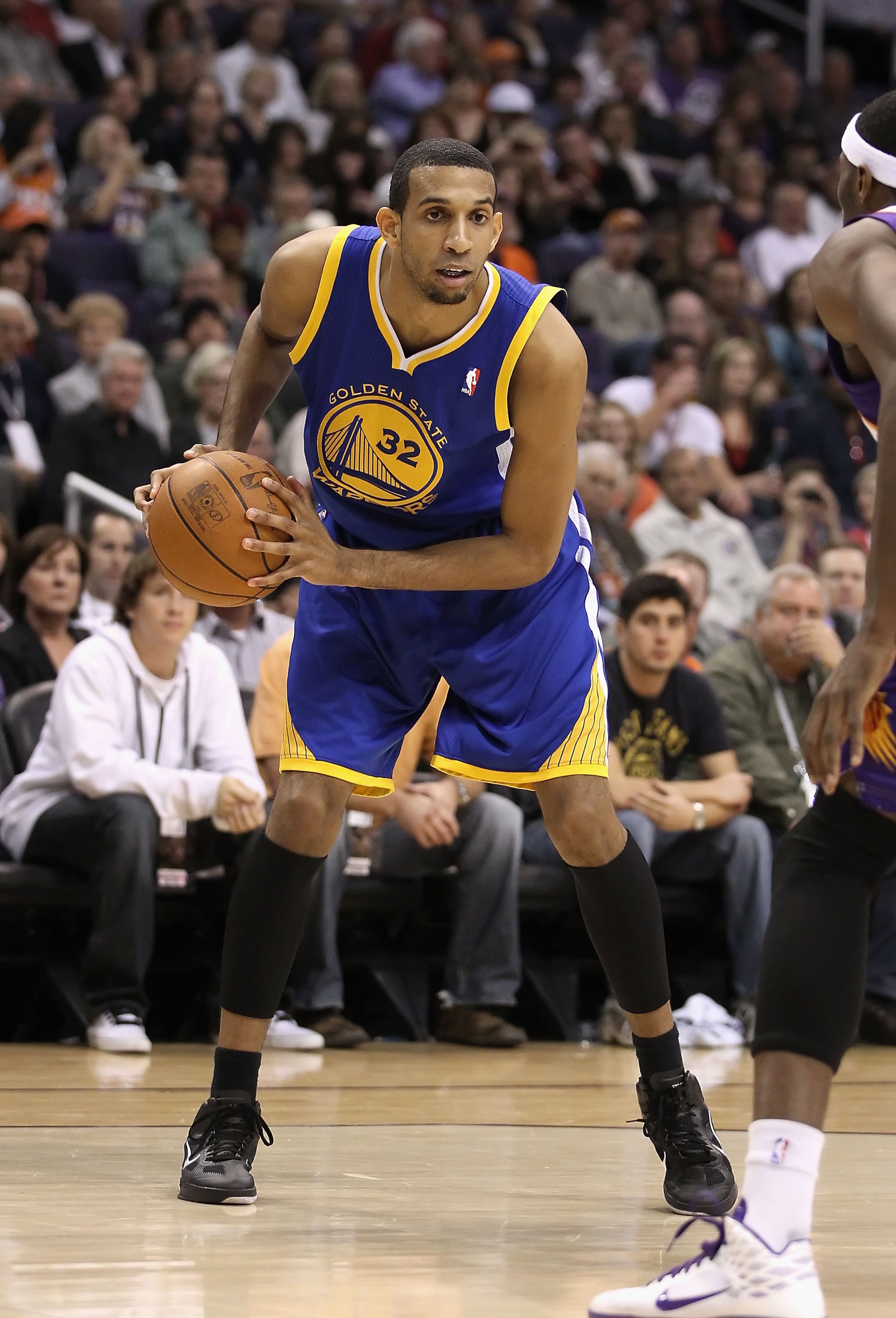 PHOENIX, AZ - FEBRUARY 10:  Brandan Wright #32 of the Golden State Warriors handles the ball during the NBA game against the Phoenix Suns at US Airways Center on February 10, 2011 in Phoenix, Arizona.  The Suns defeated the Warriors 112-88.  NOTE TO USER: