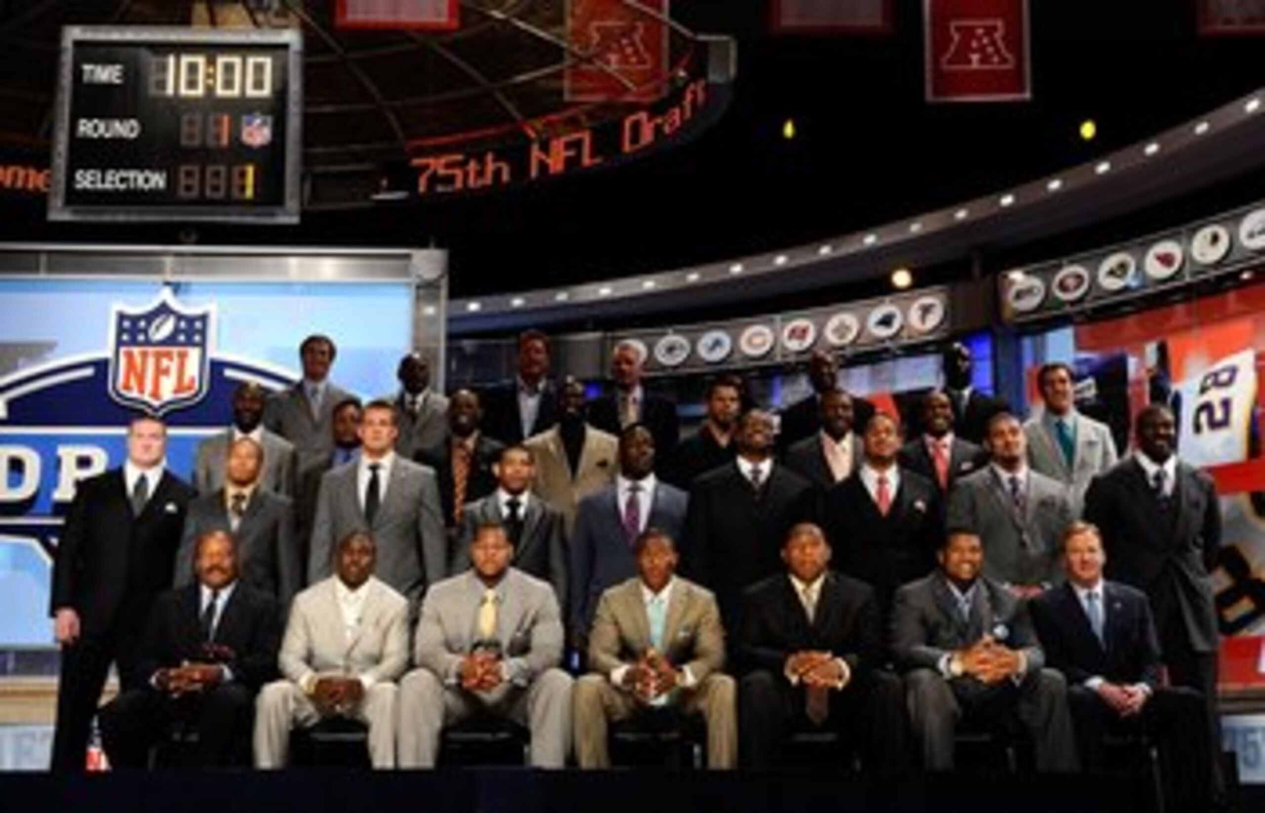 NEW YORK - APRIL 22:  2010 NFL Draft prospects pose for a group photo with NFL Commissioner Roger Goodell along with former and current NFL Players including Jim Brown, Jerry Rice, Dan Marino, Lawrence Taylor, Deion Sanders, Barry Sanders, Joe Montana, Fl