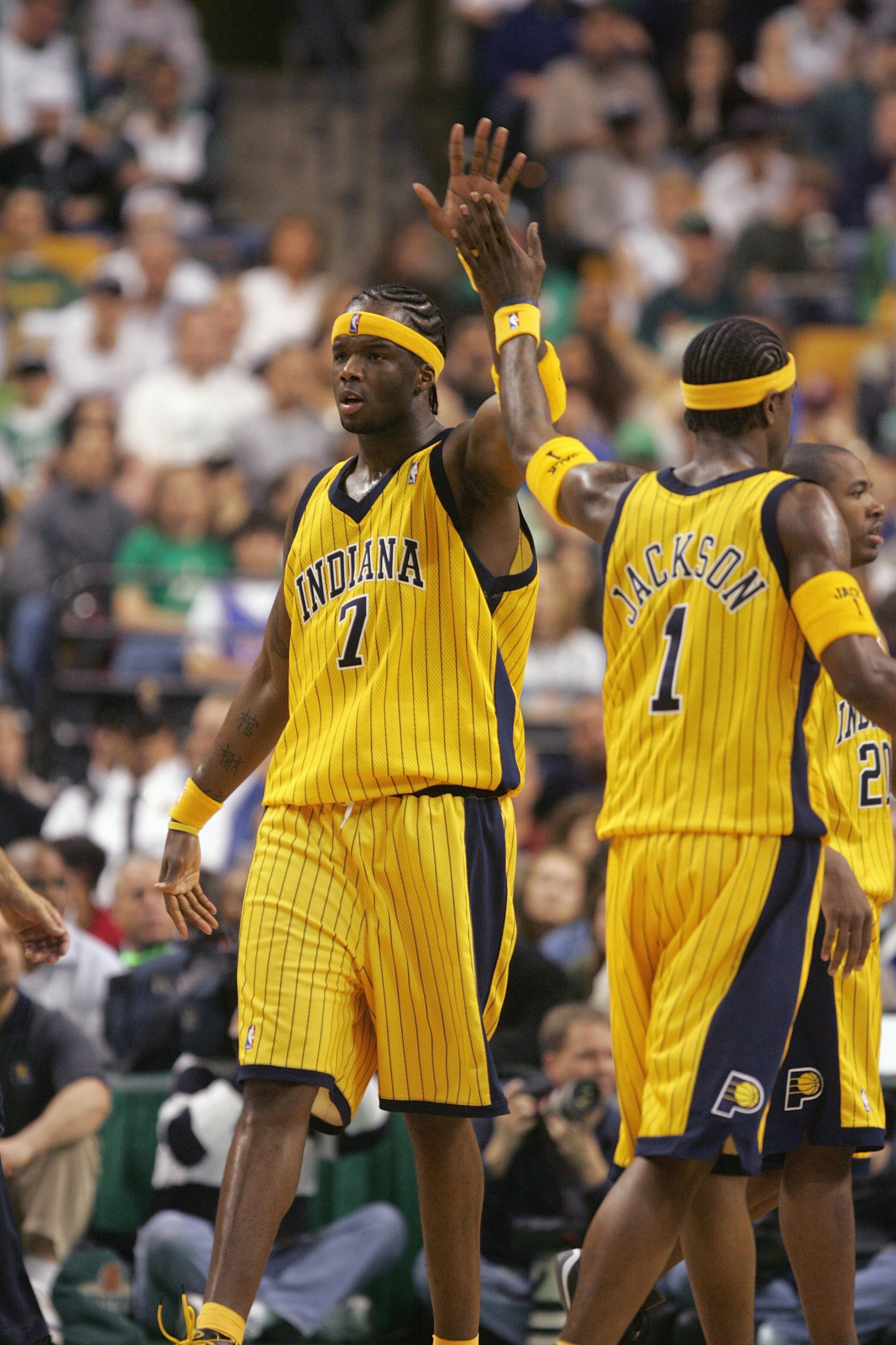 BOSTON - MAY 7:  Jermaine O'Neal #7 and Stephen Jackson #1 of the Indiana Pacers high five during the game against the Boston Celtics in Game seven of the Eastern Conference Quarterfinals during the 2005 NBA Playoffs at the FleetCenter on May 7, 2005 in B
