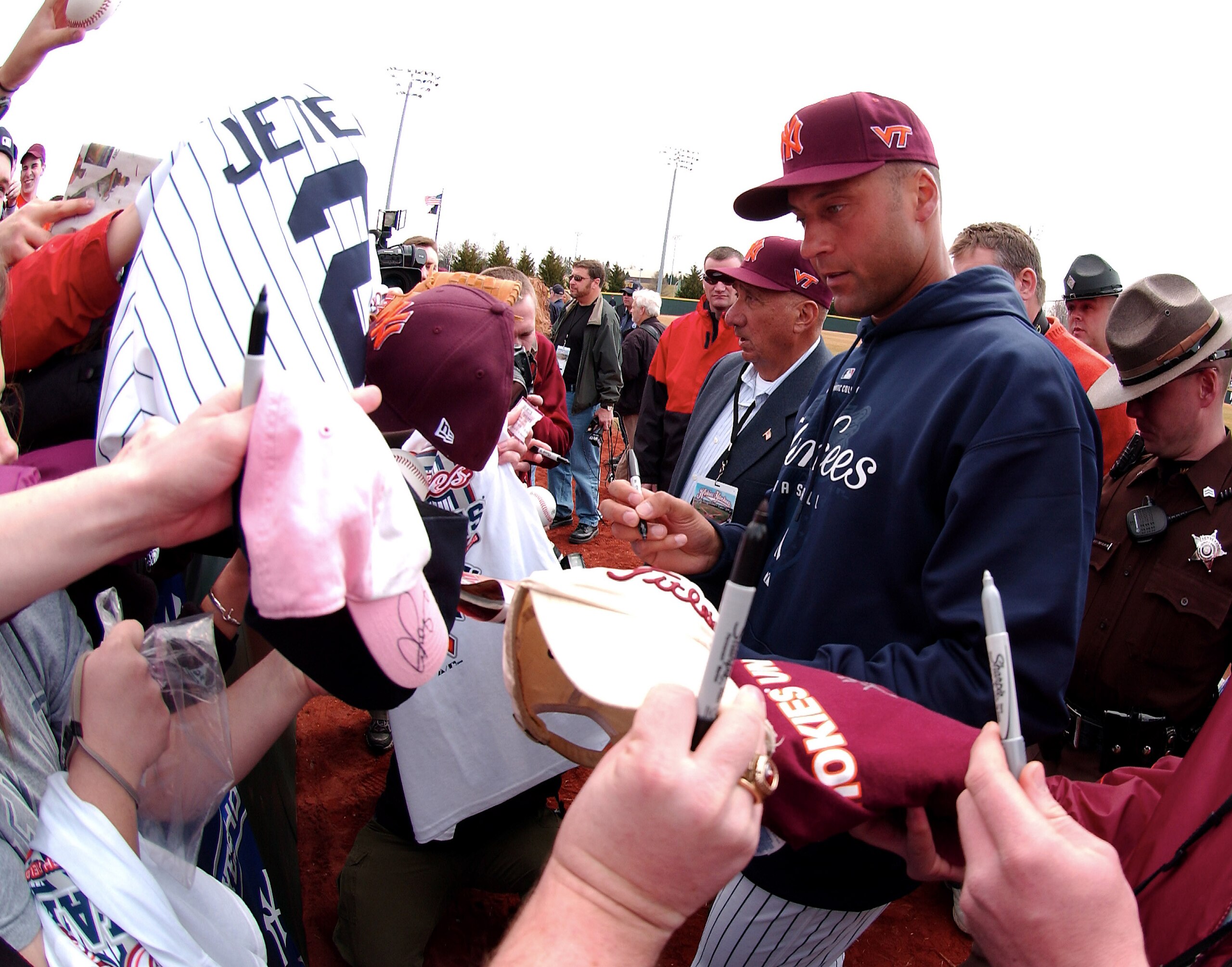 BLACKSBURG, VA - MARCH 18: Derek Jeter #2 of the New York Yankees signs autographs before a memorial exhibition game against the Virginia Tech Hokies at English Field on March 18, 2008 in Blacksburg, Virginia. (Photo by Scott Cunningham/Getty Images)