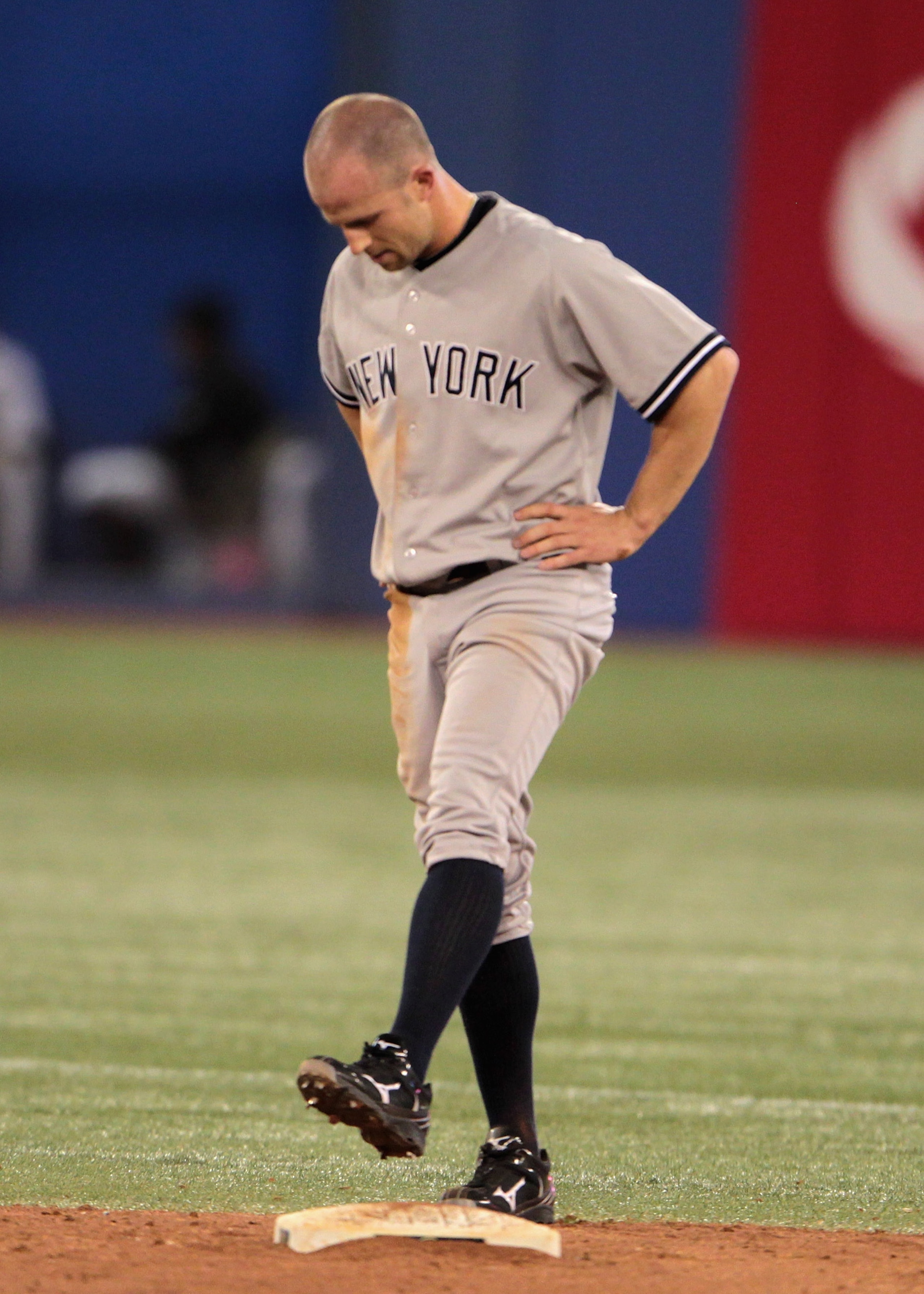 TORONTO, ON - APRIL 19:  Brett Gardner #11 of the New York Yankees waits at second base after being called out to end the inning during their game against the Toronto Blue Jays at Rogers Centre on April 19, 2011 in Toronto, Canada.  (Photo by Scott Haller
