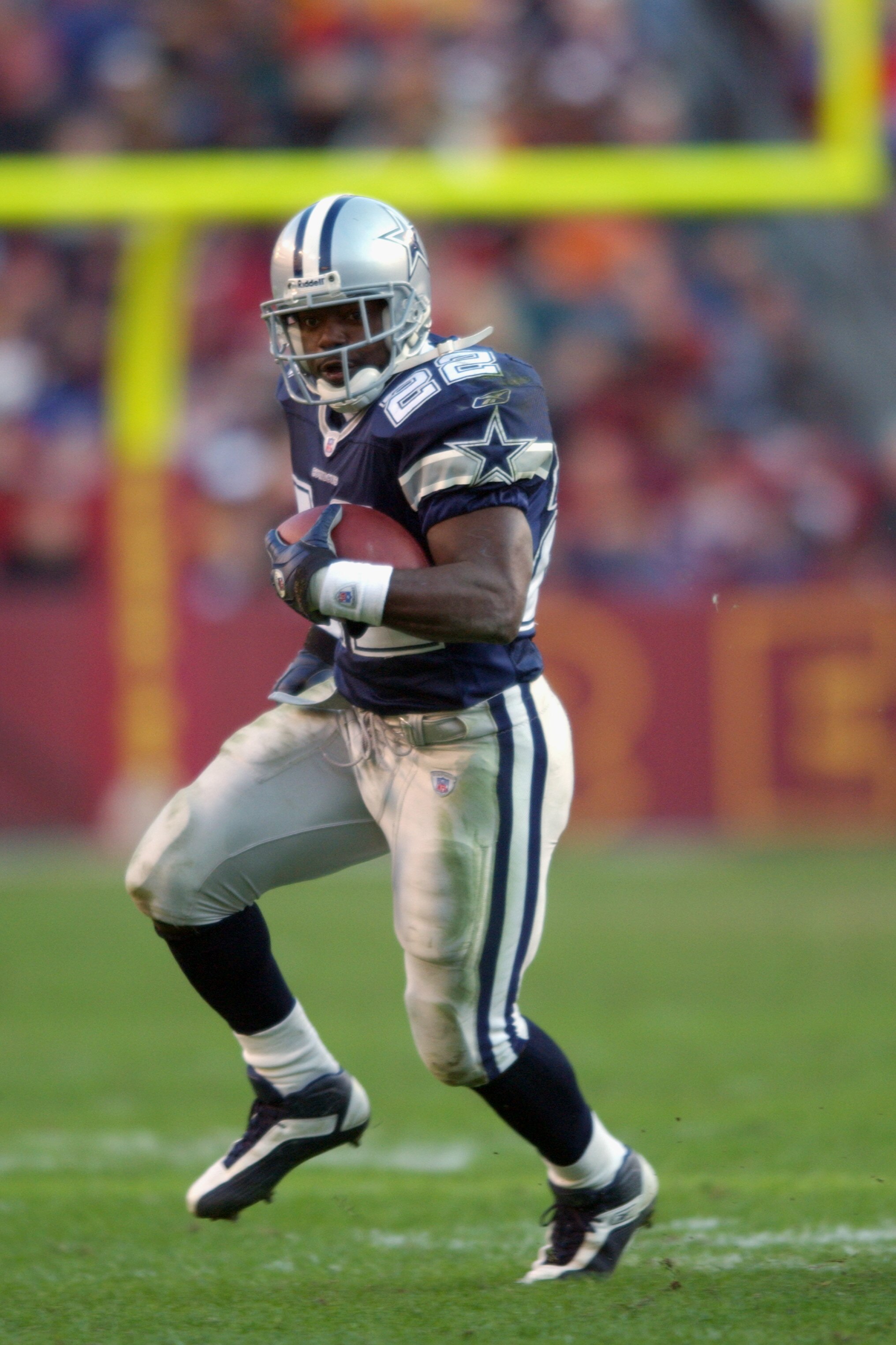 LANDOVER, MD - DECEMBER 29:  Running back Emmitt Smith #22 of the Dallas Cowboys carries the ball against the Washington Redskins during the NFL game at FedEx Field on December 29, 2002 in Landover, Maryland. The Redskins defeated the Cowboys 20-14. (Phot
