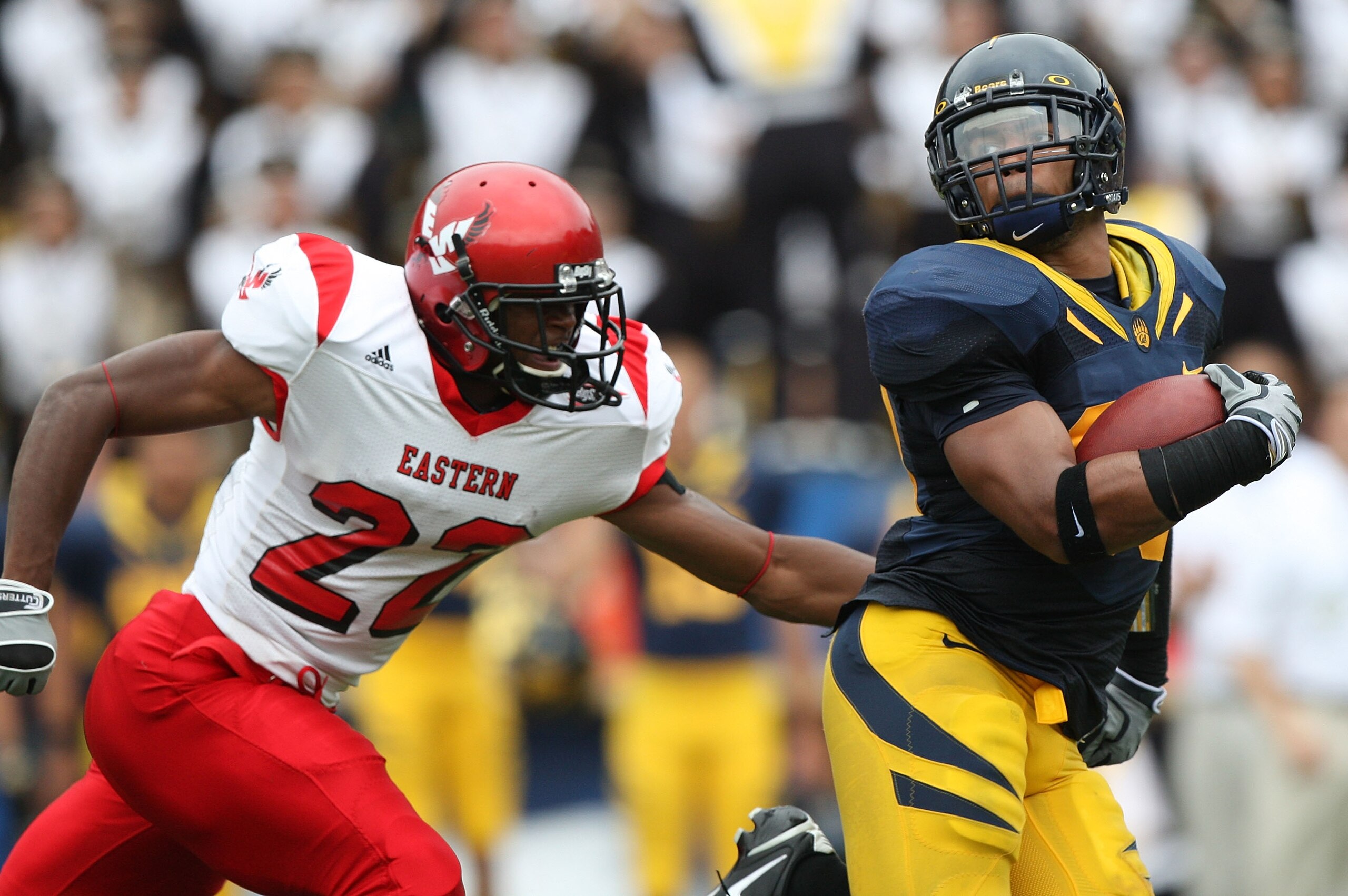 BERKELEY, CA - SEPTEMBER 12: Mychal Kendricks #30 of the California Golden Bears returns a fumble for 45 yards against Taiwan Jones #22 of the Eastern Washington Eagles at Memorial Stadium on September 12, 2009 in Berkeley, California. (Photo by Jed Jacob BERKELEY, CA - SEPTEMBER 12: Mychal Kendricks #30 of the California Golden Bears returns a fumble for 45 yards against Taiwan Jones #22 of the Eastern Washington Eagles at Memorial Stadium on September 12, 2009 in Berkeley, California. (Photo by Jed Jacob