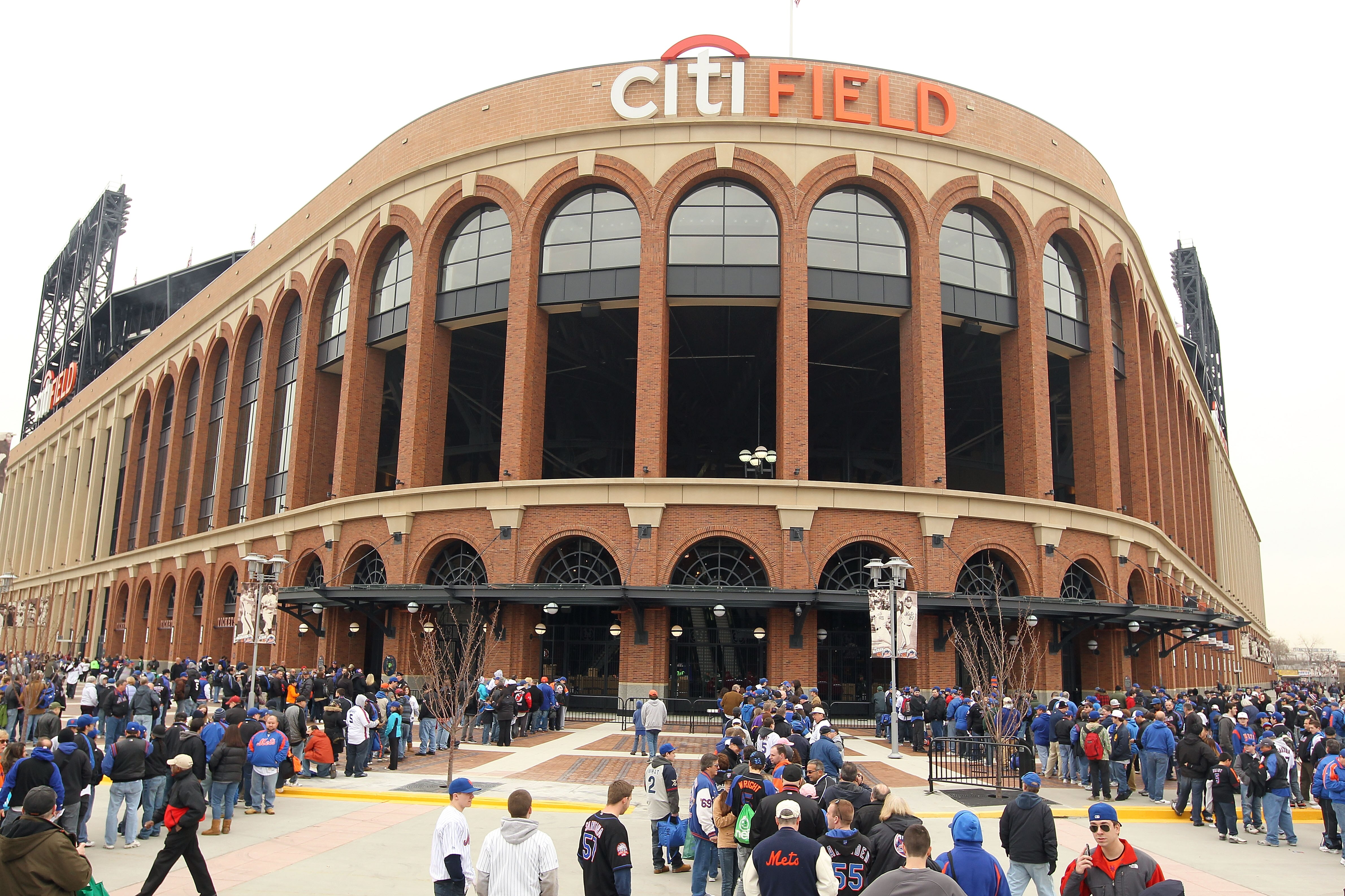 NEW YORK, NY - APRIL 08:  Fans of the New York Mets wait to enter the stadium to watch the Mets' home opener against the Washington Nationals at Citi Field on April 8, 2011 in the Flushing neighborhood of Queens in New York City.  (Photo by Al Bello/Getty