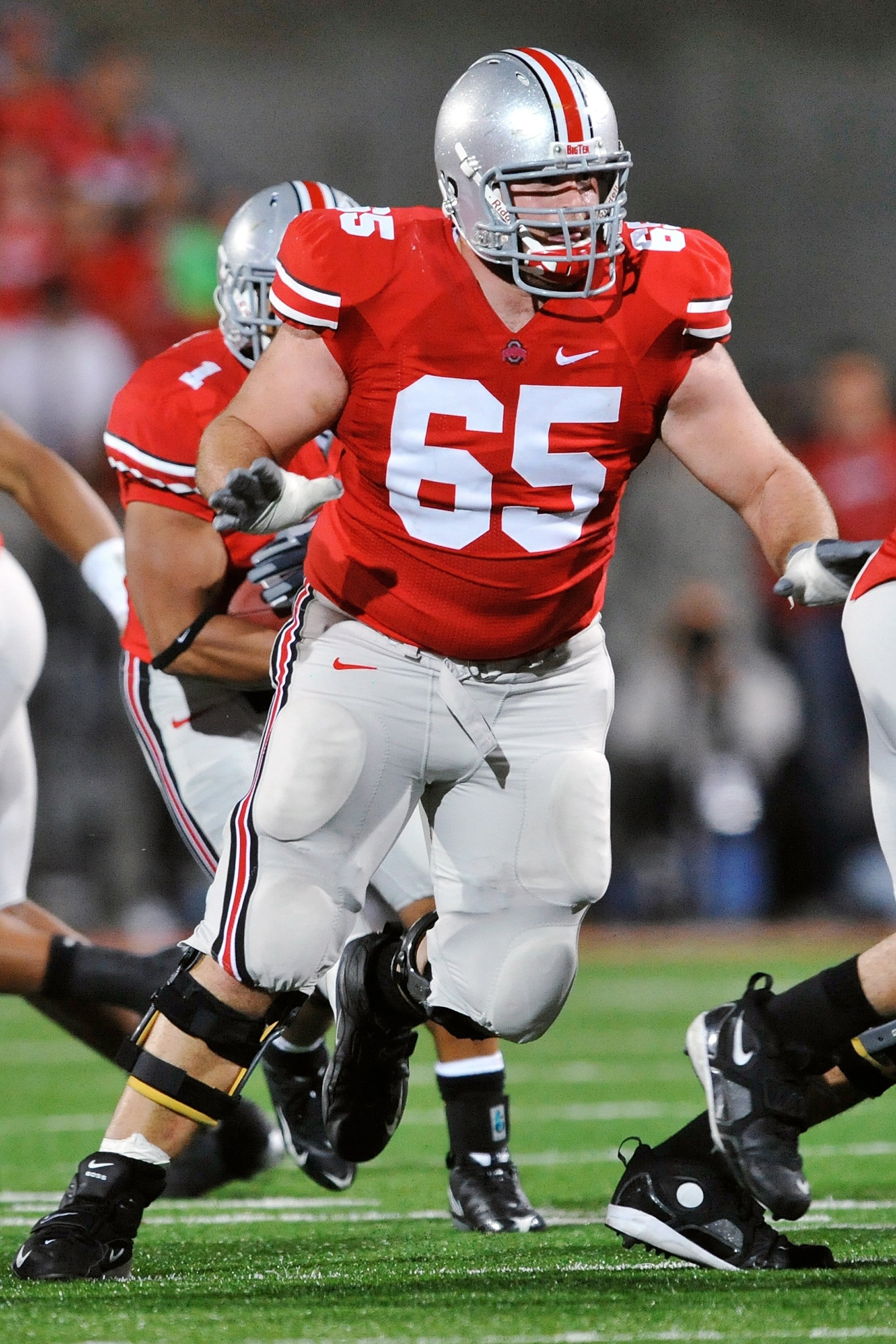 COLUMBUS, OH - NOVEMBER 14:  Offensive lineman Justin Boren #65 of the Ohio State Buckeyes blocks against the Iowa Hawkeyes at Ohio Stadium on November 14, 2009 in Columbus, Ohio.  (Photo by Jamie Sabau/Getty Images)