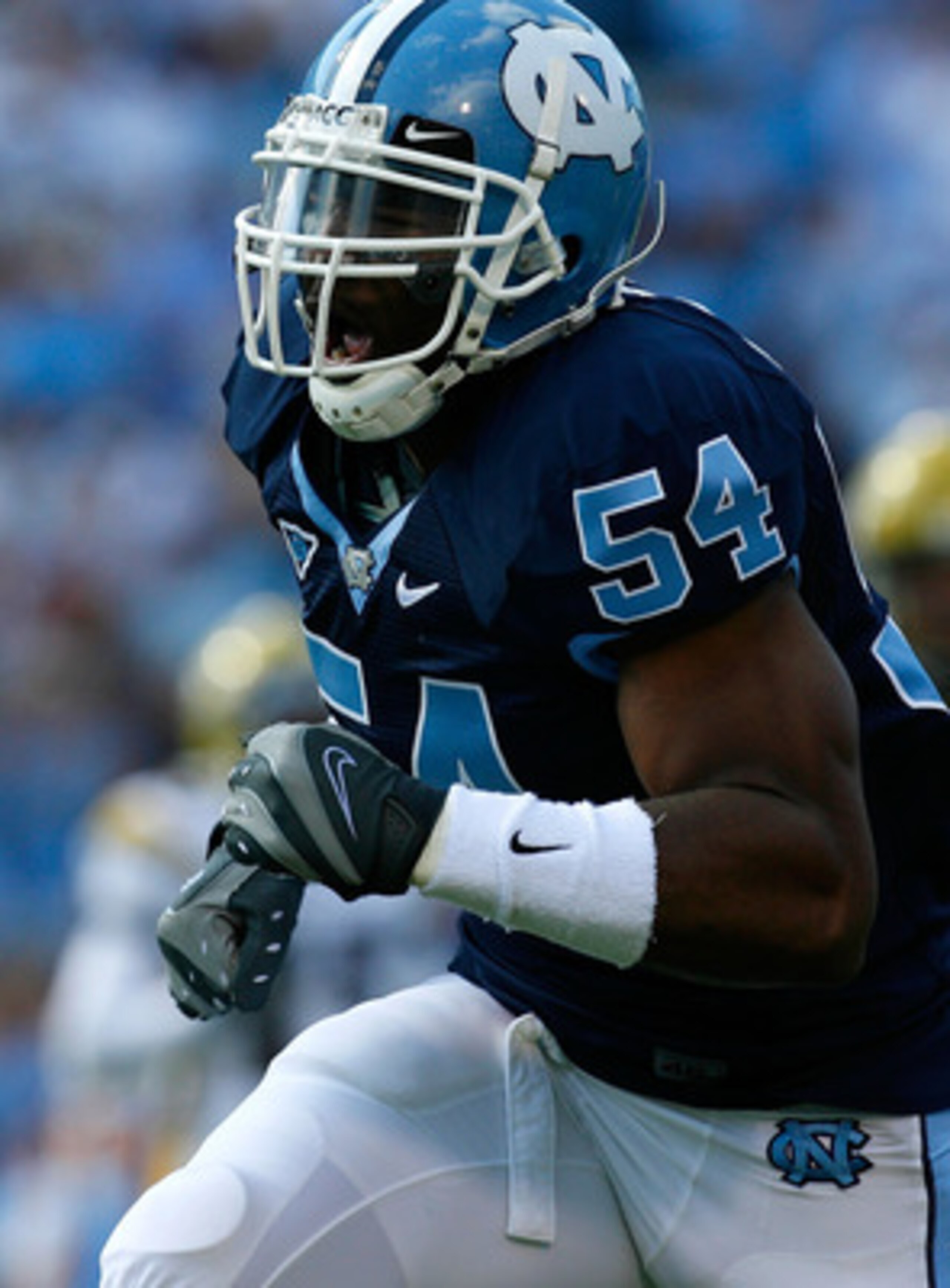 CHAPEL HILL, NC - NOVEMBER 08: Linebacker Bruce Carter #54 of the North Carolina Tar Heels reacts after a defensive stop against the Georgia Tech Yellow Jackets during the game at Kenan Stadium on November 8, 2008 in Chapel Hill, North Carolina. (Photo CHAPEL HILL, NC - NOVEMBER 08: Linebacker Bruce Carter #54 of the North Carolina Tar Heels reacts after a defensive stop against the Georgia Tech Yellow Jackets during the game at Kenan Stadium on November 8, 2008 in Chapel Hill, North Carolina. (Photo