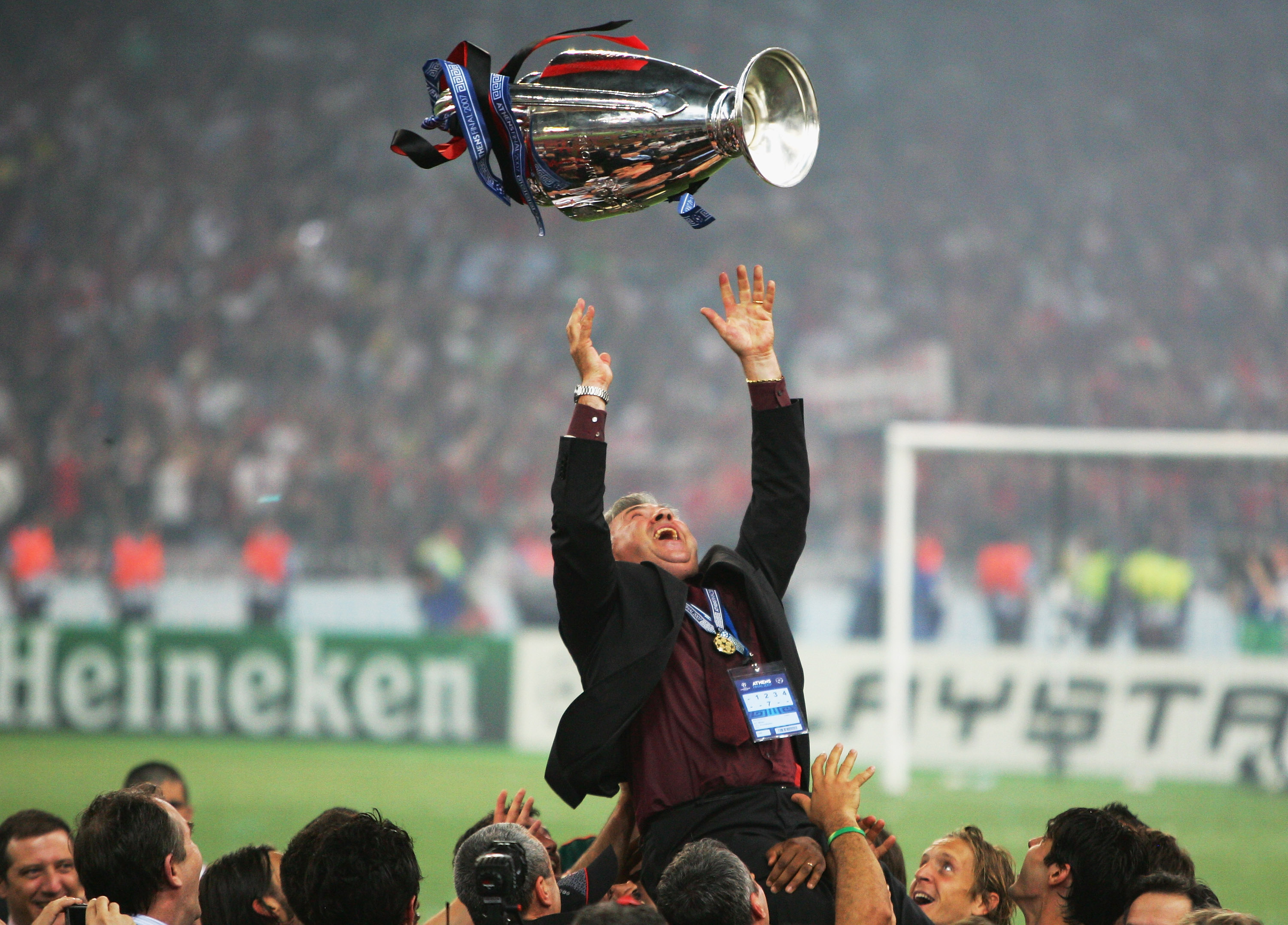ATHENS, GREECE - MAY 23:  Carlo Ancelotti, the Milan manager throws the trophy in the air, whilst celebrating his teams 2-1 victoryduring the UEFA Champions League Final match between Liverpool and AC Milan at the Olympic Stadium on May 23, 2007 in Athens