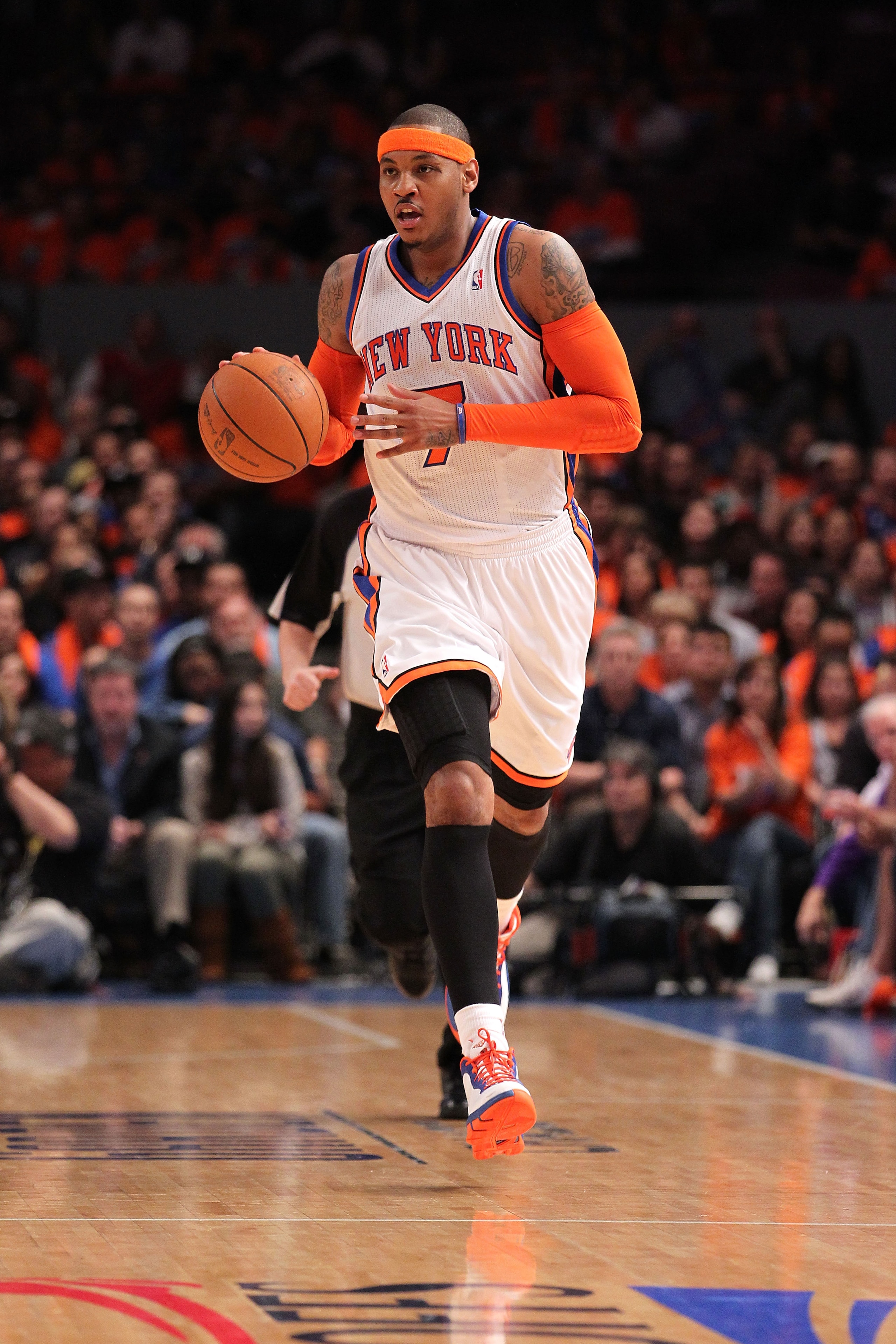NEW YORK, NY - APRIL 24: Carmelo Anthony #7 of the New York Knicks brings the ball up court agaist the Boston Celtics in Game Four of the Eastern Conference Quarterfinals during the 2011 NBA Playoffs on April 24, 2011 at Madison Square Garden in New York NEW YORK, NY - APRIL 24: Carmelo Anthony #7 of the New York Knicks brings the ball up court agaist the Boston Celtics in Game Four of the Eastern Conference Quarterfinals during the 2011 NBA Playoffs on April 24, 2011 at Madison Square Garden in New York