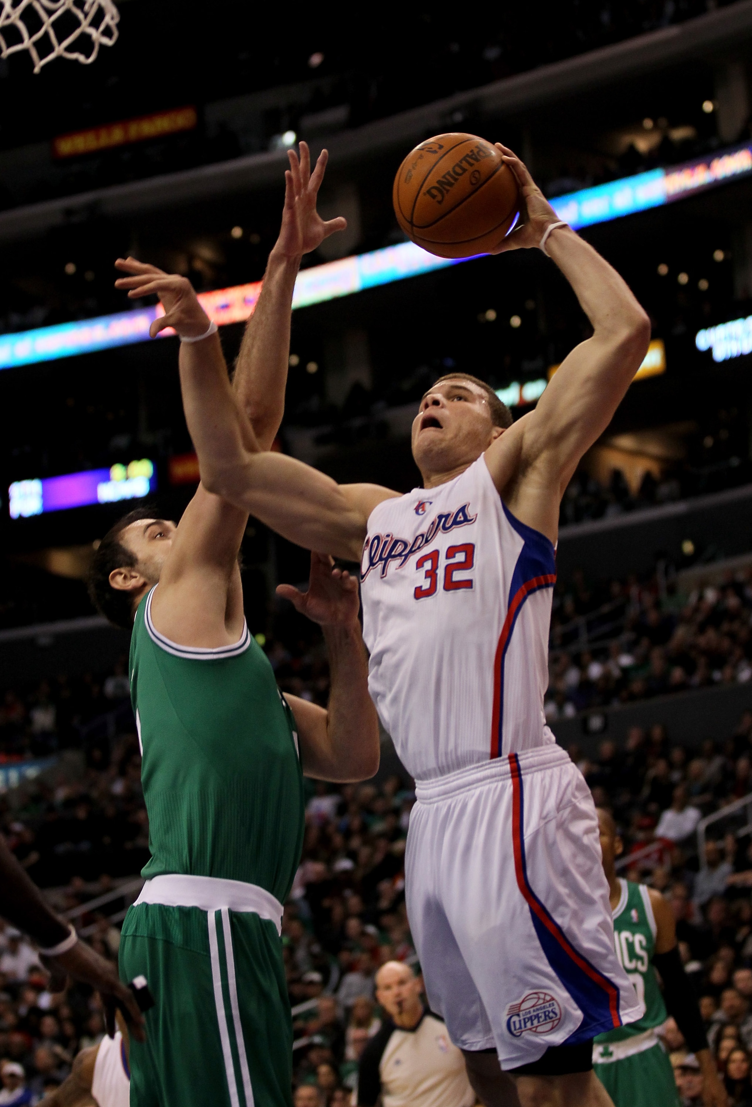 LOS ANGELES, CA - FEBRUARY 26: Blake Griffin #32 of the Los Angeles Clippers goes for a dunk over Nenad Krstic #4 of the Boston Celtics at Staples Center on February 26, 2011 in Los Angeles, California. The Celtics won 99-92. NOTE TO USER: User express LOS ANGELES, CA - FEBRUARY 26: Blake Griffin #32 of the Los Angeles Clippers goes for a dunk over Nenad Krstic #4 of the Boston Celtics at Staples Center on February 26, 2011 in Los Angeles, California. The Celtics won 99-92. NOTE TO USER: User express