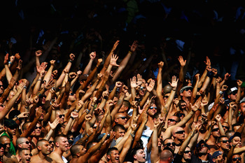 LONDON, ENGLAND - AUGUST 08:  Napoli fans sing and chant during the Bobby Moore Cup between West Ham United and Napoli at Upton Park on August 8, 2009 in London, England.  (Photo by Paul Gilham/Getty Images)