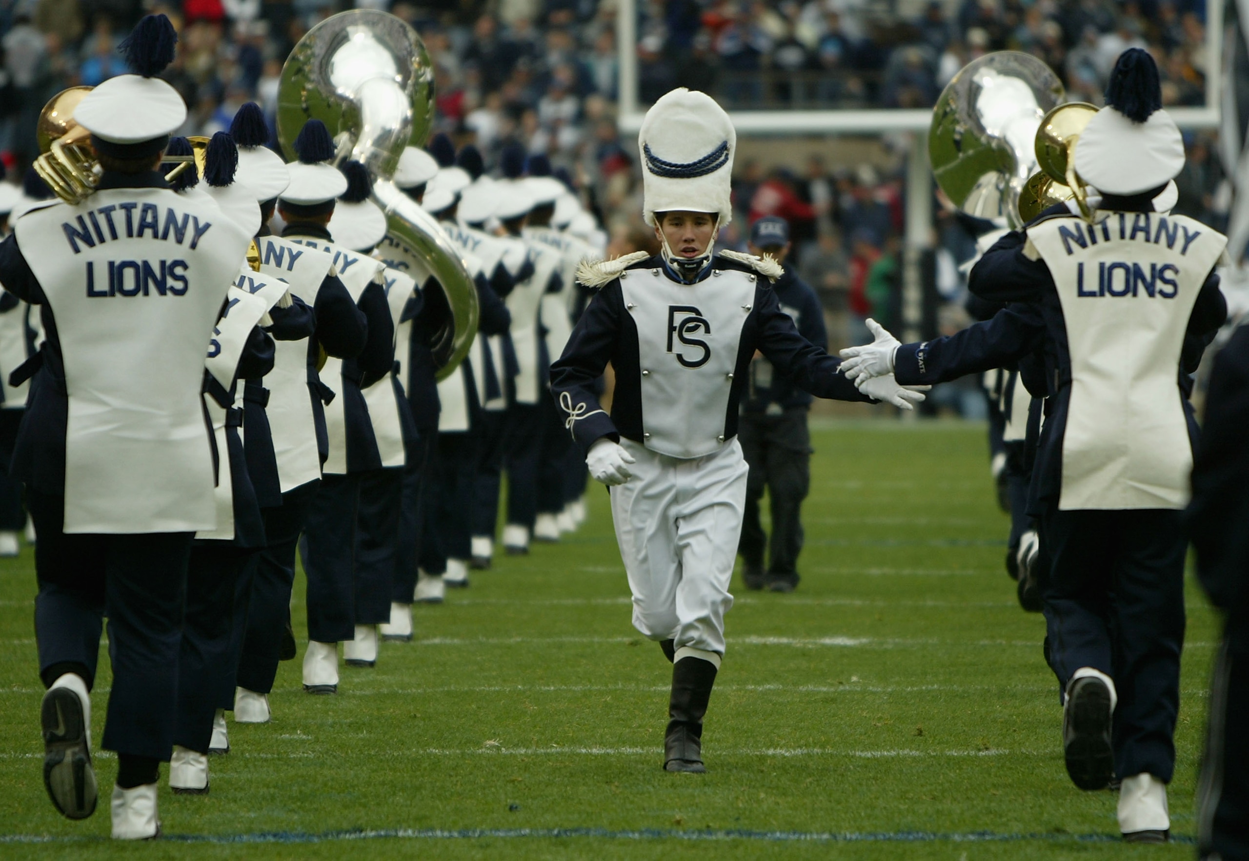 STATE COLLEGE, PA - OCTOBER 23:  Drummajor Kevin Rudy and the Penn State Blue Band perform prior to the game as the Iowa Hawkeyes defeated Penn State Nittnay Lions 6-4 during NCAA football at Beaver Stadium on October 23, 2004 in State College, Pennsylvan