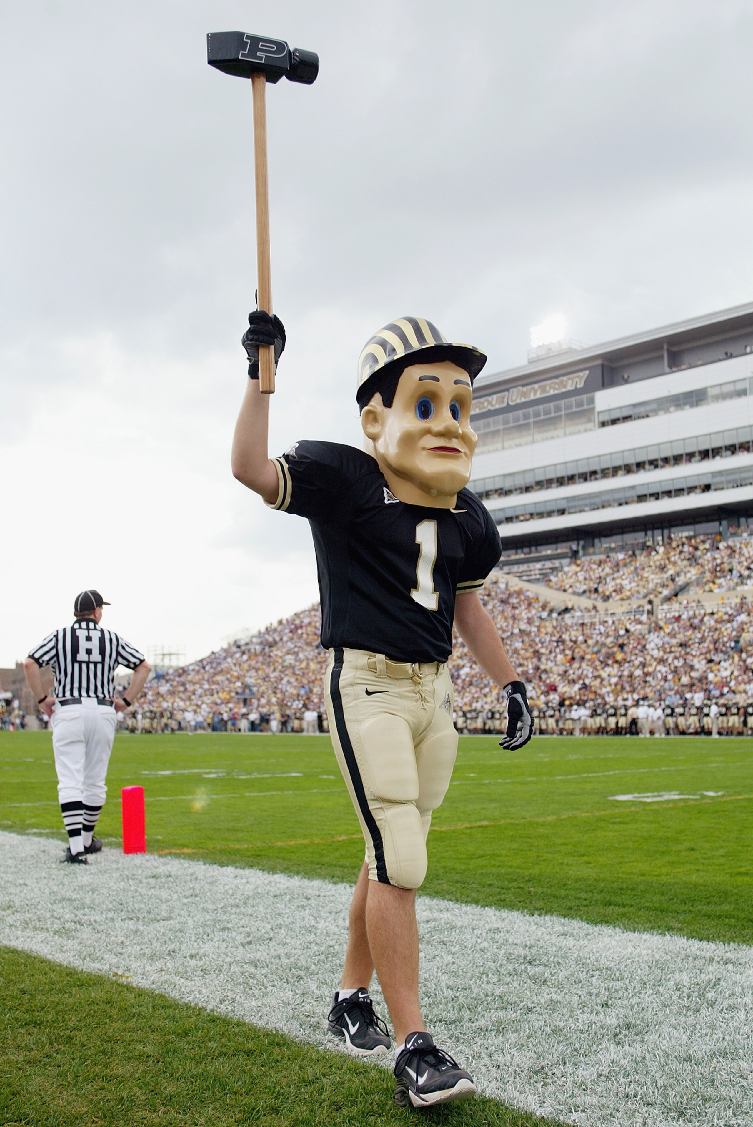 WEST LAFAYETTE, IN - OCTOBER 11:  The mascot of the Purdue Boilermakers raises a prop sledge hammer during a game against Penn State on October 11, 2003 at Ross-Ade Stadium in West Lafayette, Indiana.  Purdue defeated Penn State 28-14.  (Photo by Andy Lyo